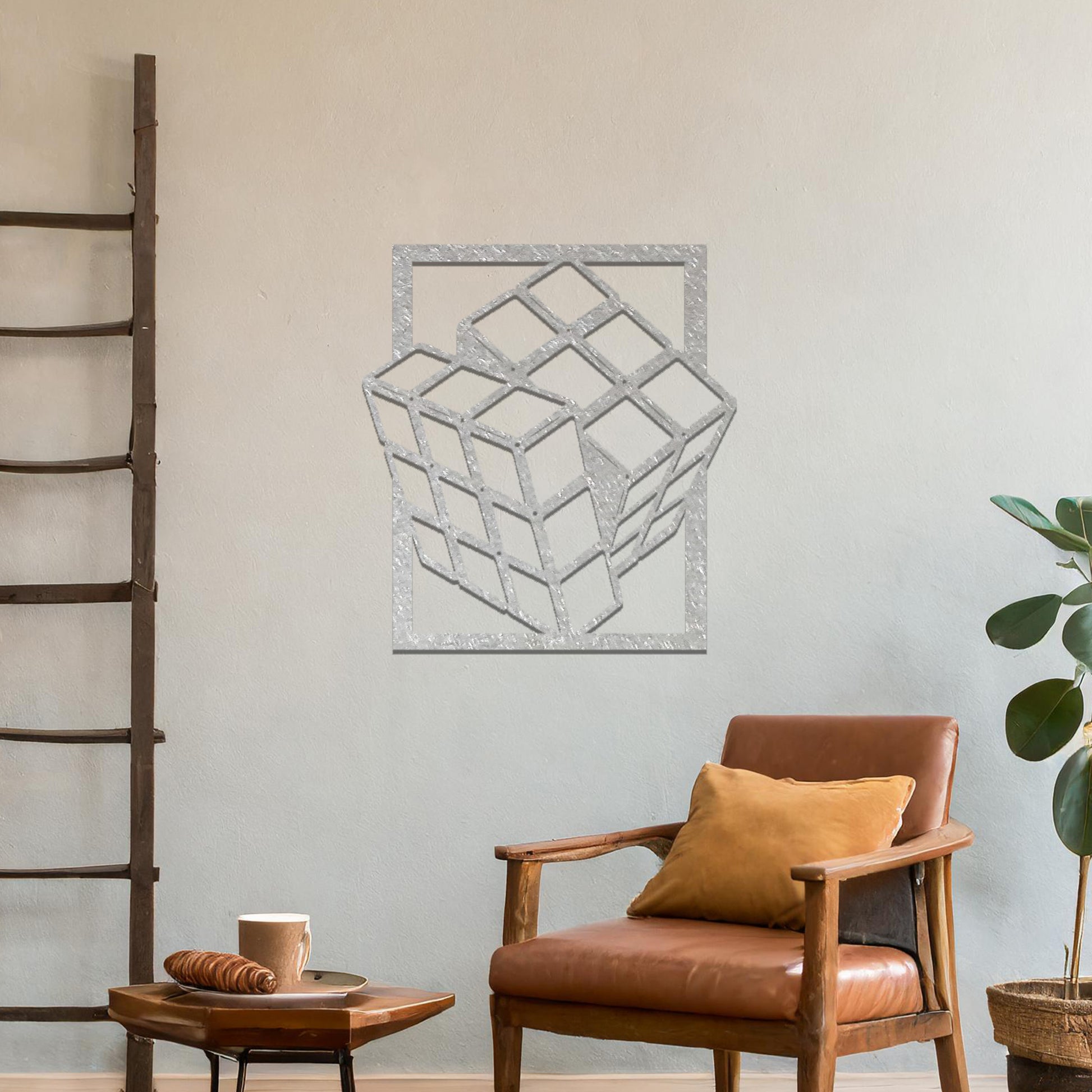 Metal wall art featuring a rectangular design of a three-dimensional cube, showcasing bold geometric shapes and a modern aesthetic as a statement piece.