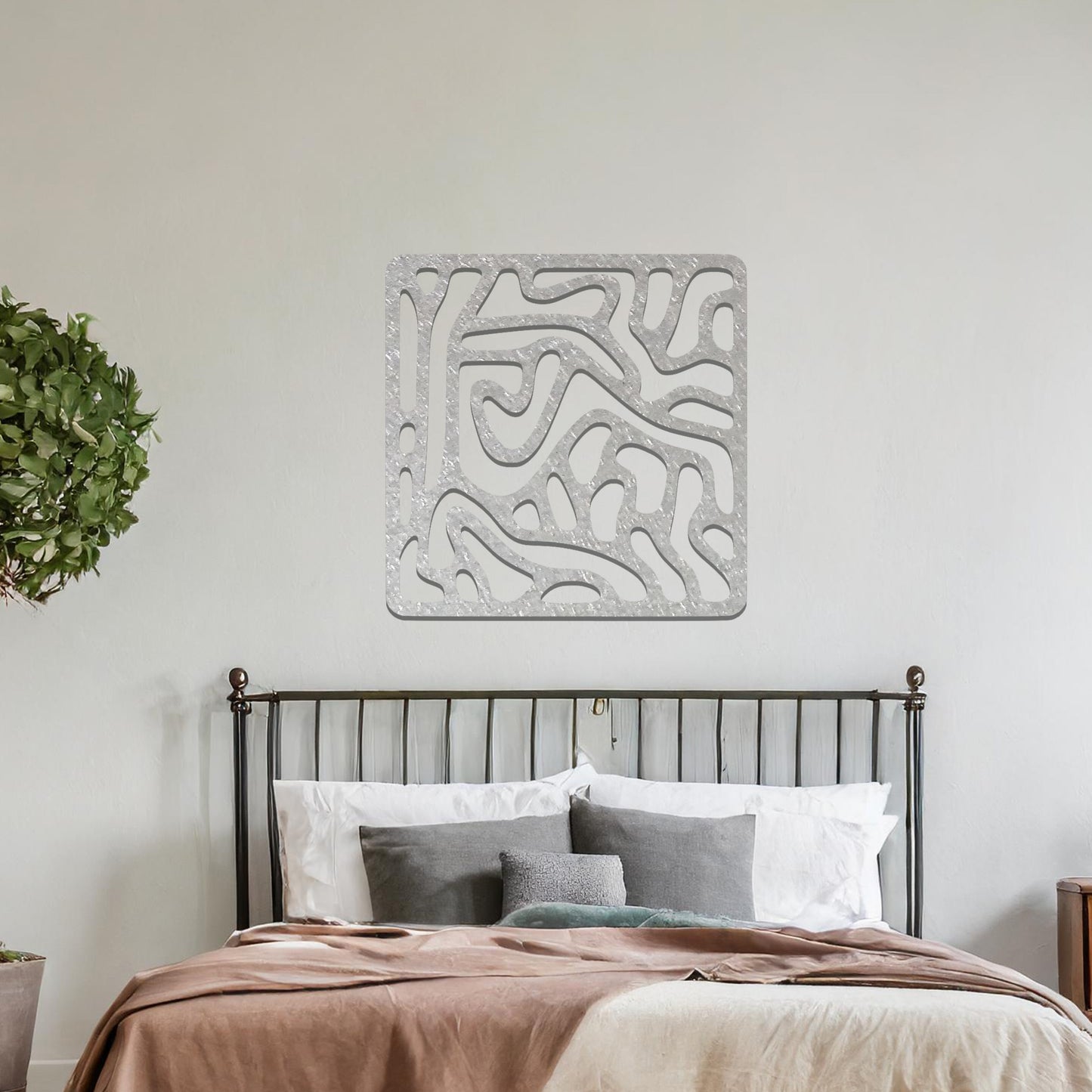 Abstract flowing line design with curved and irregular patterns, creating a dynamic and modern composition. The art is displayed on a neutral wall in a minimalist room with contemporary decor.
