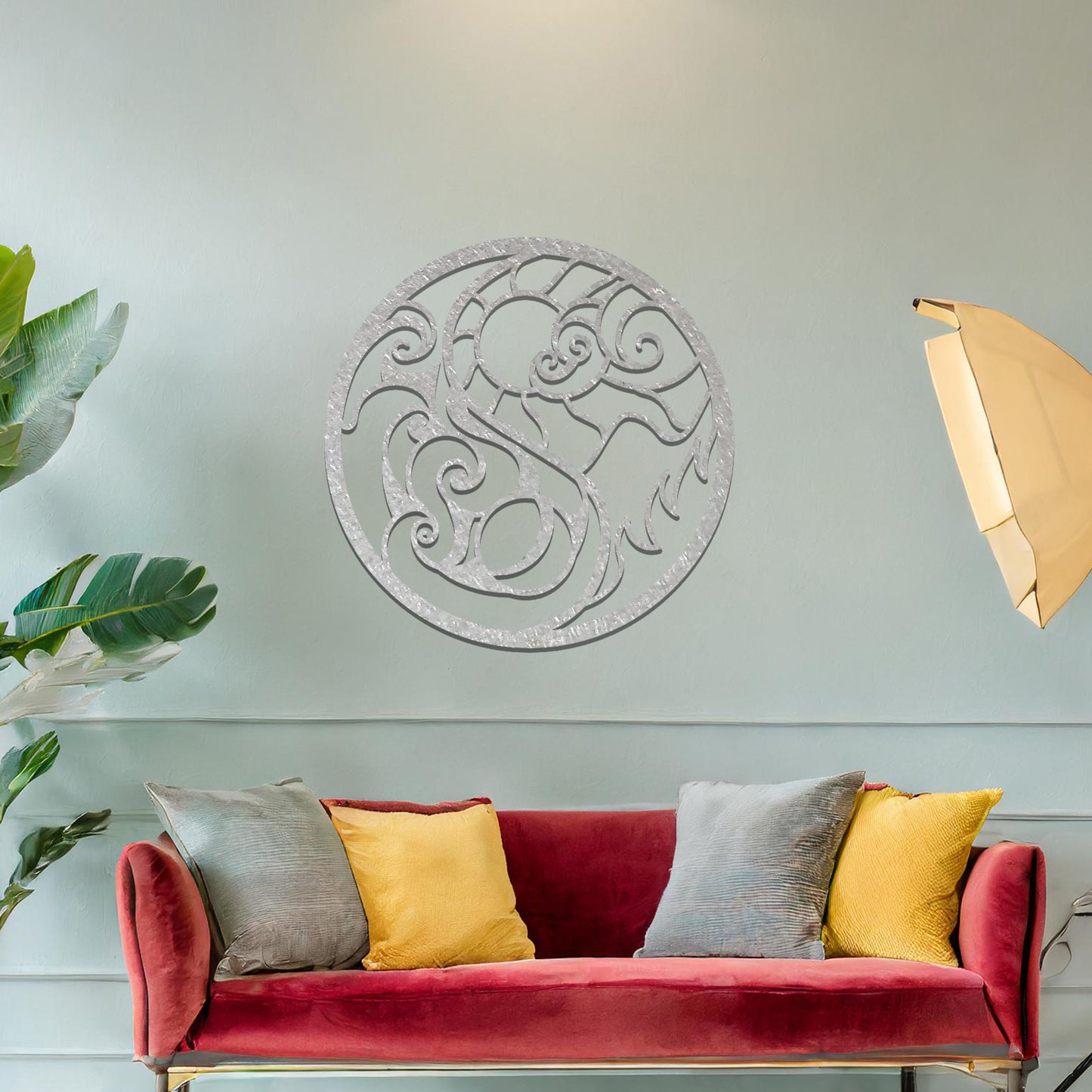 Intricate swirling design forming a circular shape, with dynamic lines representing movement and contrast. The art is displayed on a neutral wall in a stylish room with modern decor and vibrant flowers.