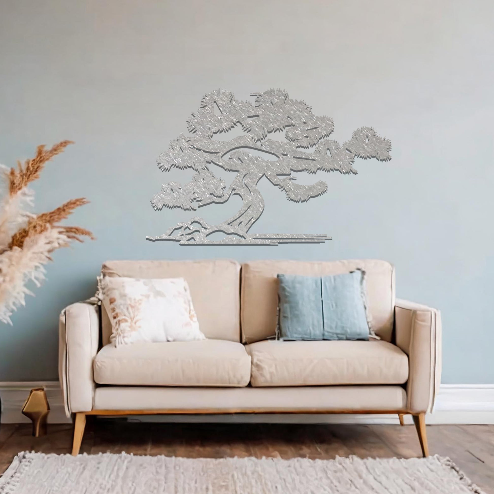 Metal wall art showcasing a serene bonsai tree design with flowing branches and a textured trunk, adding an artistic and calming element to the living space.