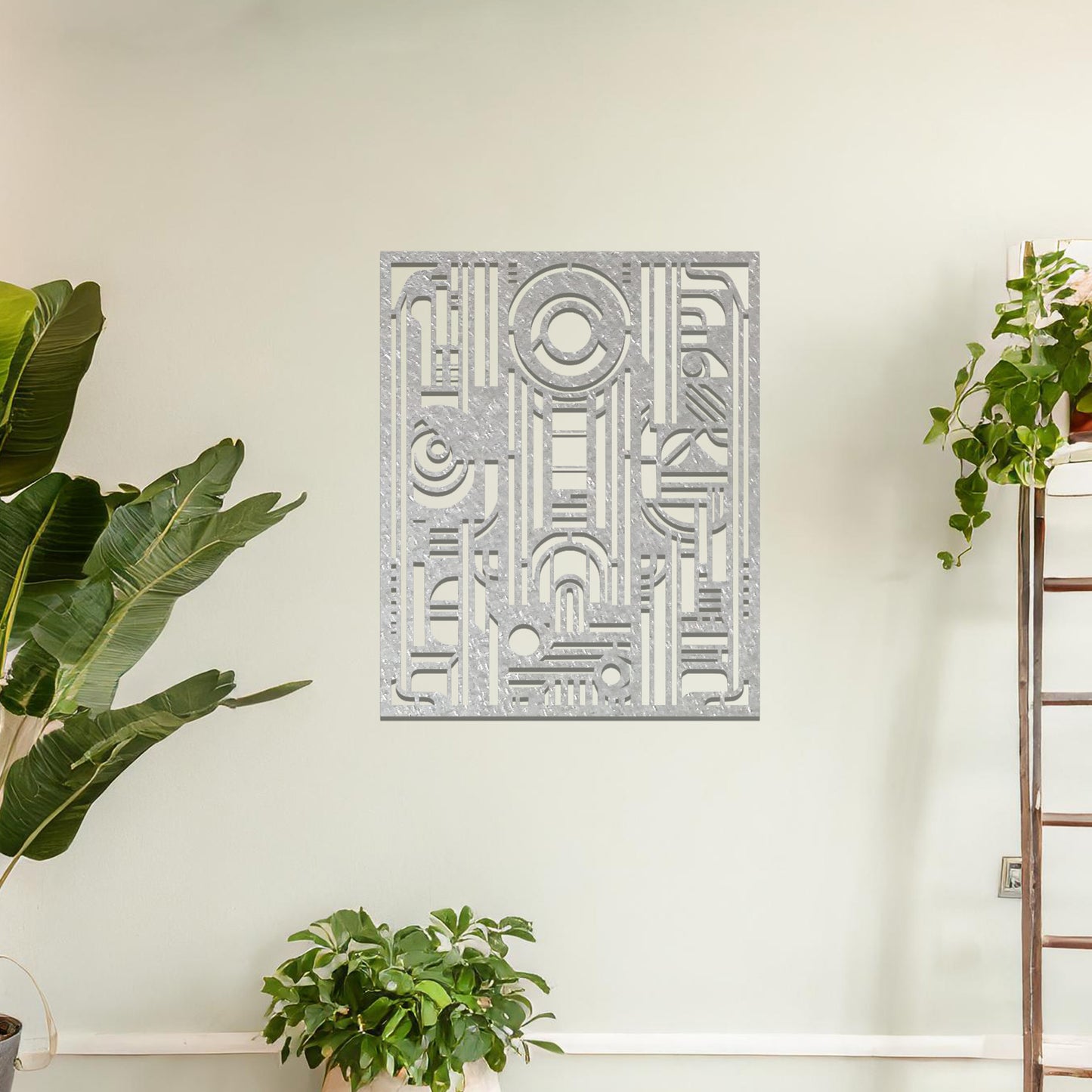 A geometric metal wall art featuring an intricate pattern with a combination of circles, lines, and arches. The design is framed within a rectangular shape, displayed on a neutral wall. The piece adds a modern touch to the room's decor.