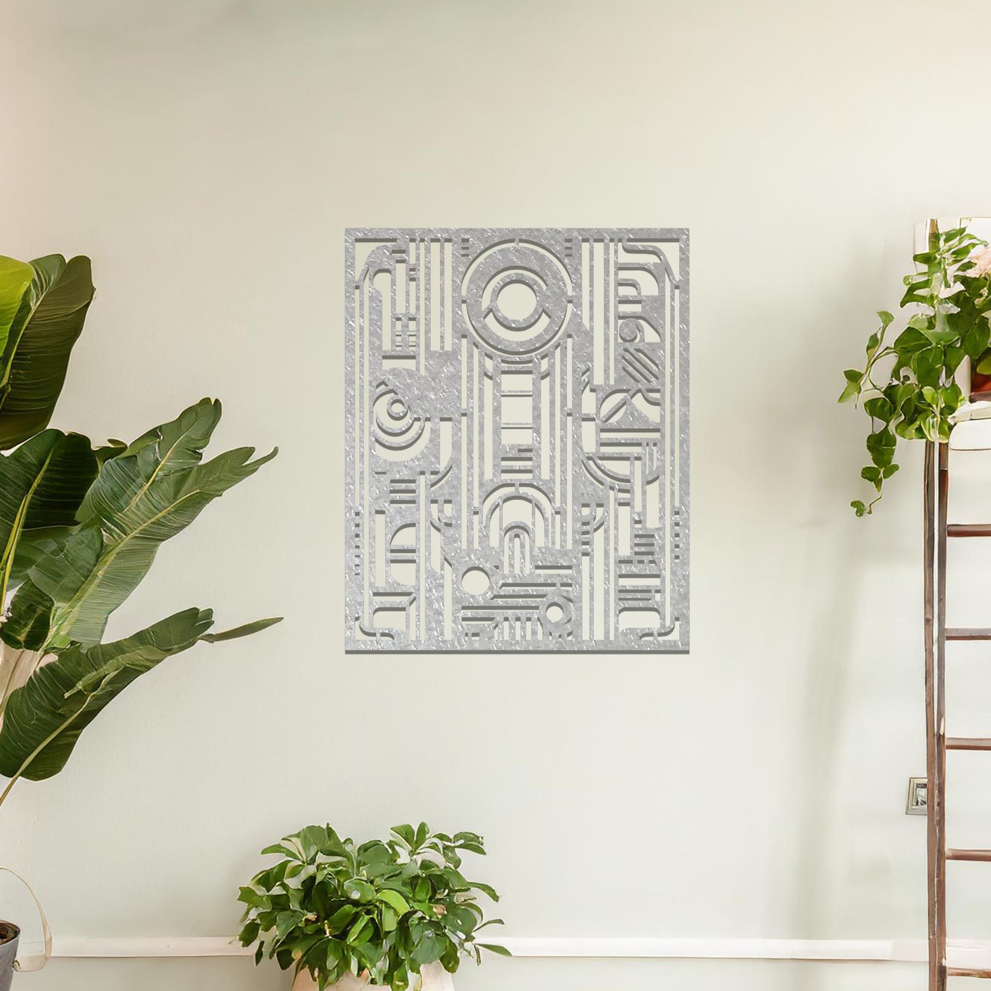 A geometric metal wall art featuring an intricate pattern with a combination of circles, lines, and arches. The design is framed within a rectangular shape, displayed on a neutral wall. The piece adds a modern touch to the room's decor.