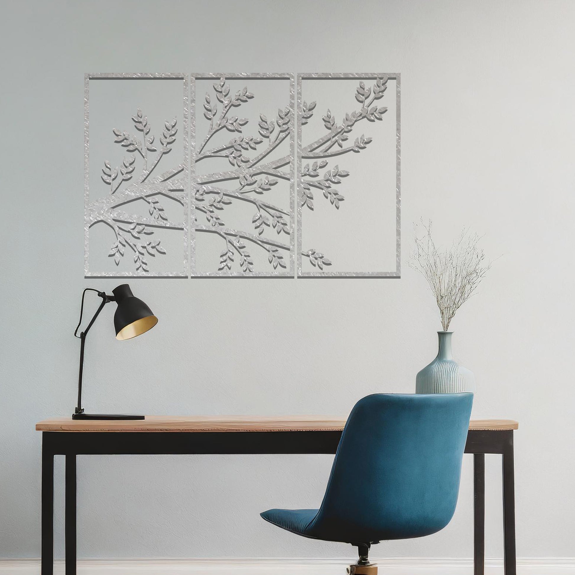 A three-panel artwork featuring an intricate branch design adorned with detailed leaves, creating a captivating and natural aesthetic. Perfect for enhancing any wall space with elegance.