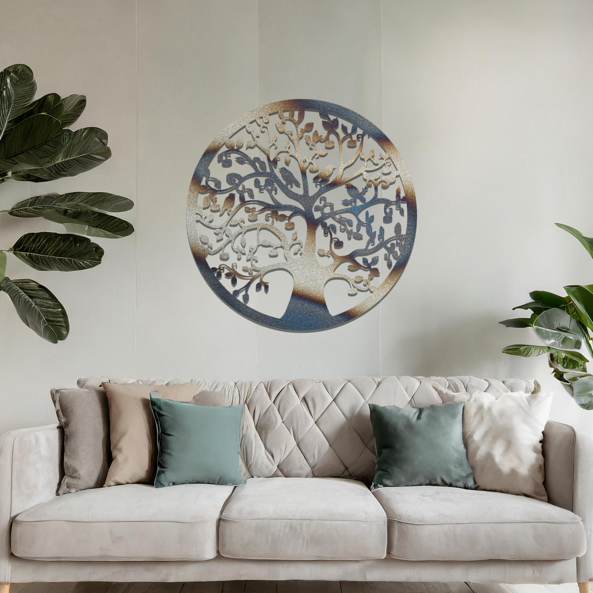 Metal wall art featuring a circular tree design with intricate branches and leaves, showcasing a detailed and balanced composition, displayed on a neutral wall within modern decor.