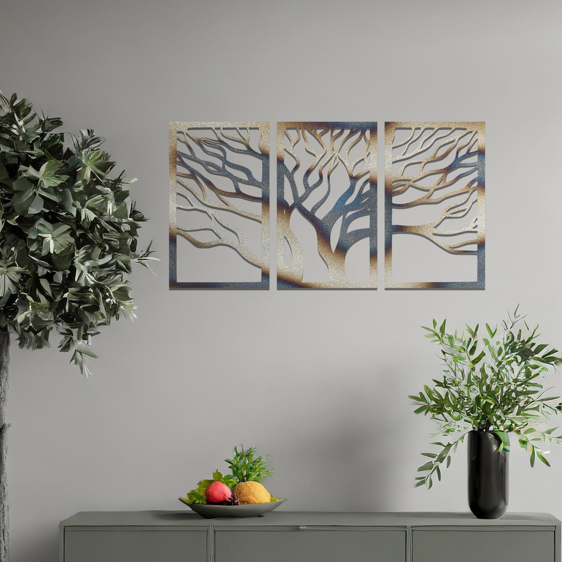 Three-panel metal wall art featuring intricately cut tree branches in a flowing design, creating a dynamic and organic effect.