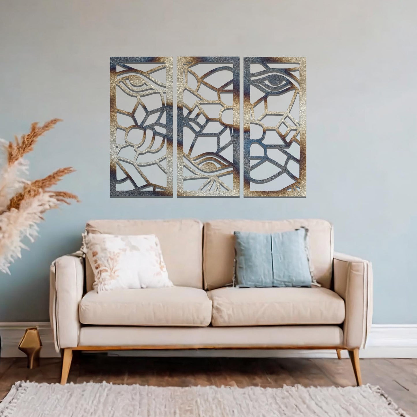 Decorative metal wall art featuring a set of three geometric panels with intricate abstract designs, mounted on a neutral wall within modern room decor. The focus is on the unique craftsmanship and harmonious composition of the wall art, enhancing the contemporary aesthetic of the space.