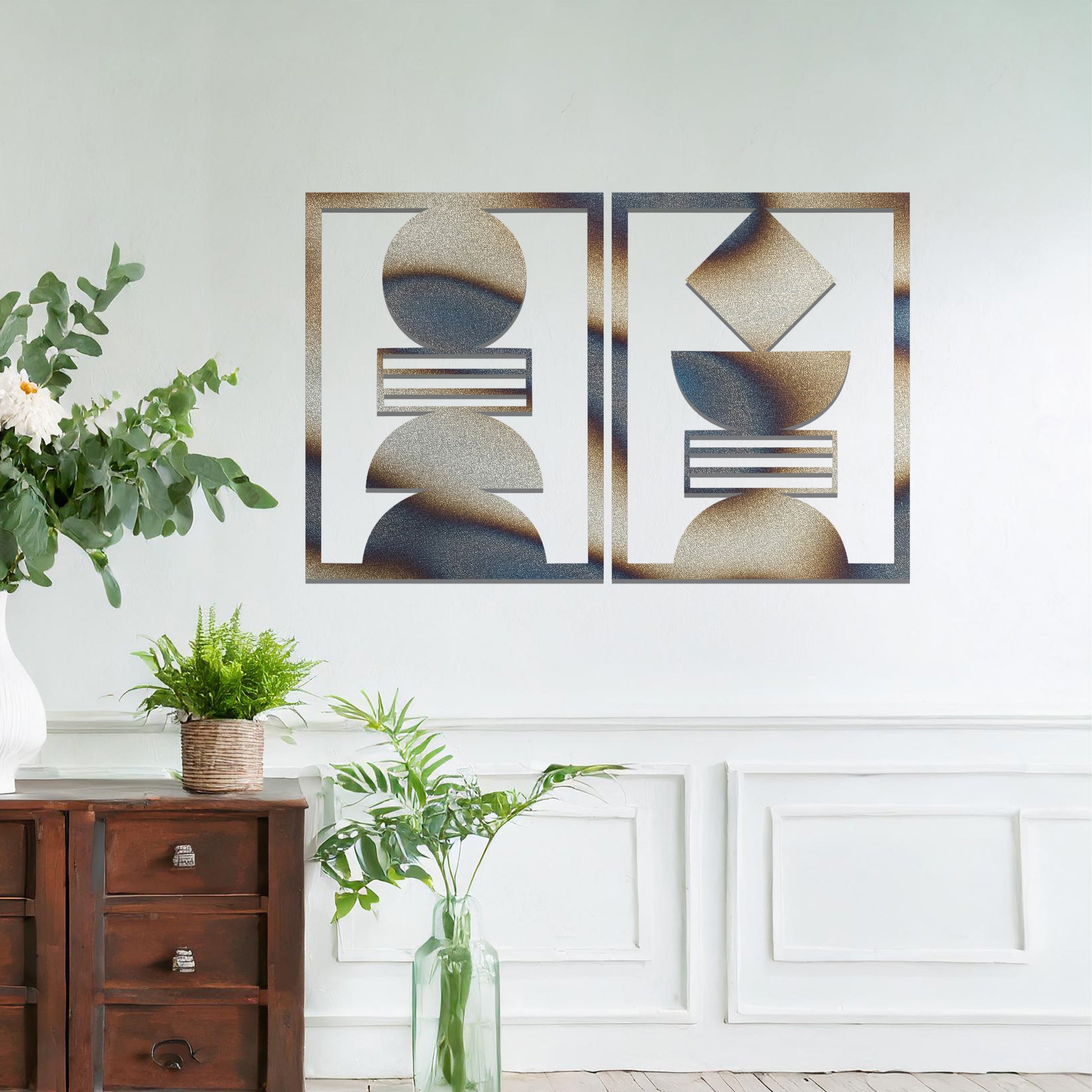 A metal wall art set featuring geometric shapes, including circles and a diamond, arranged in a balanced and symmetrical design. The art is displayed on a neutral wall within modern room decor, adding an elegant and abstract touch to the space.