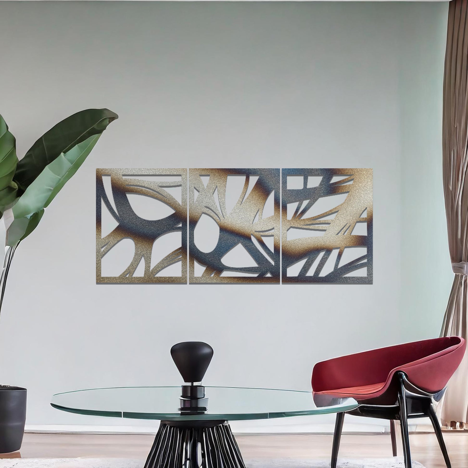 Metal wall art featuring a three-panel design with abstract organic shapes, mounted on a neutral wall within modern decor. The rust finish and fluid, nature-inspired forms create a striking focal point, enhancing the room’s natural aesthetic.