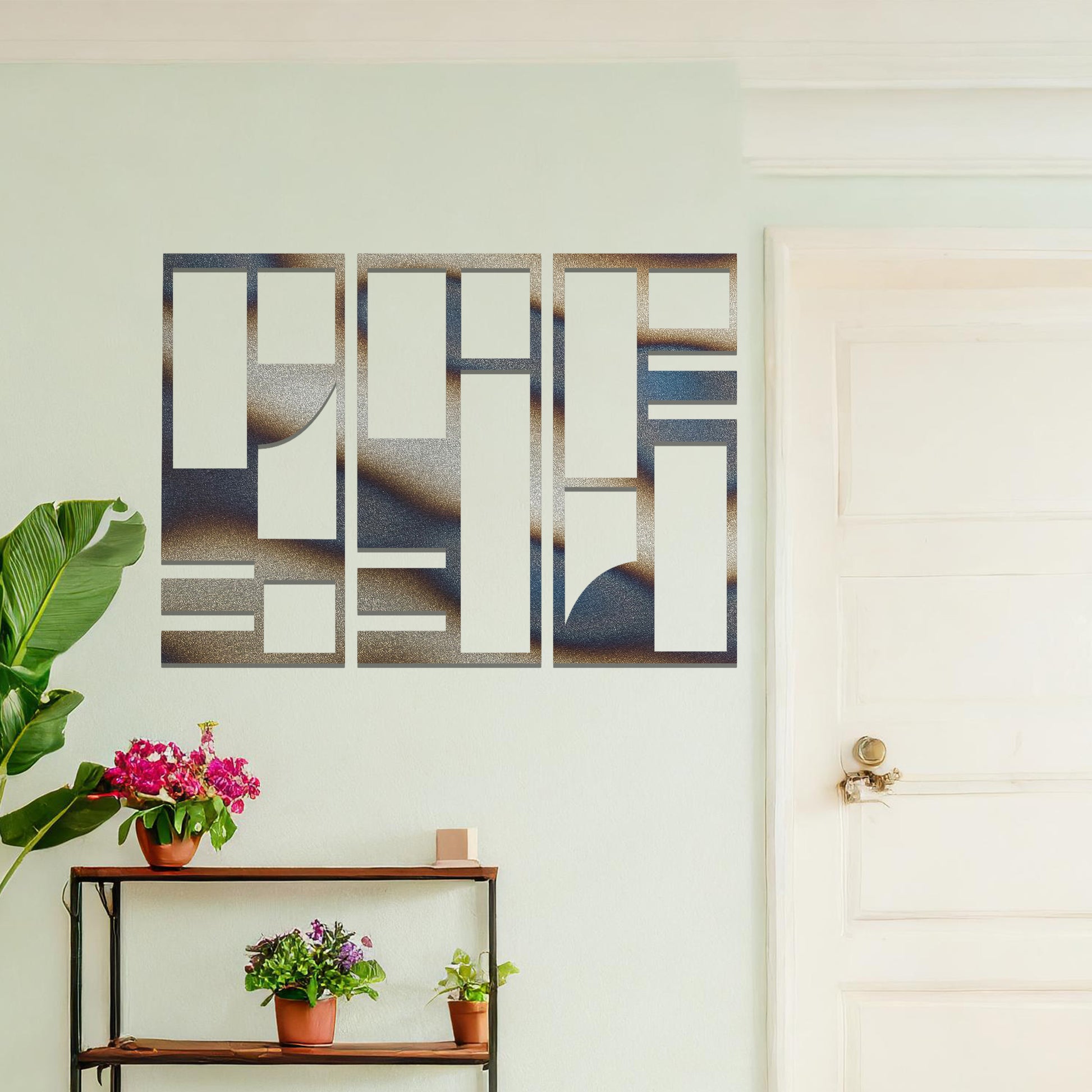 Abstract metal wall art set of three panels with geometric designs featuring rectangular and square shapes, curved lines, and clean angles. The art is displayed on a neutral wall within modern room decor, adding a contemporary touch to the space.