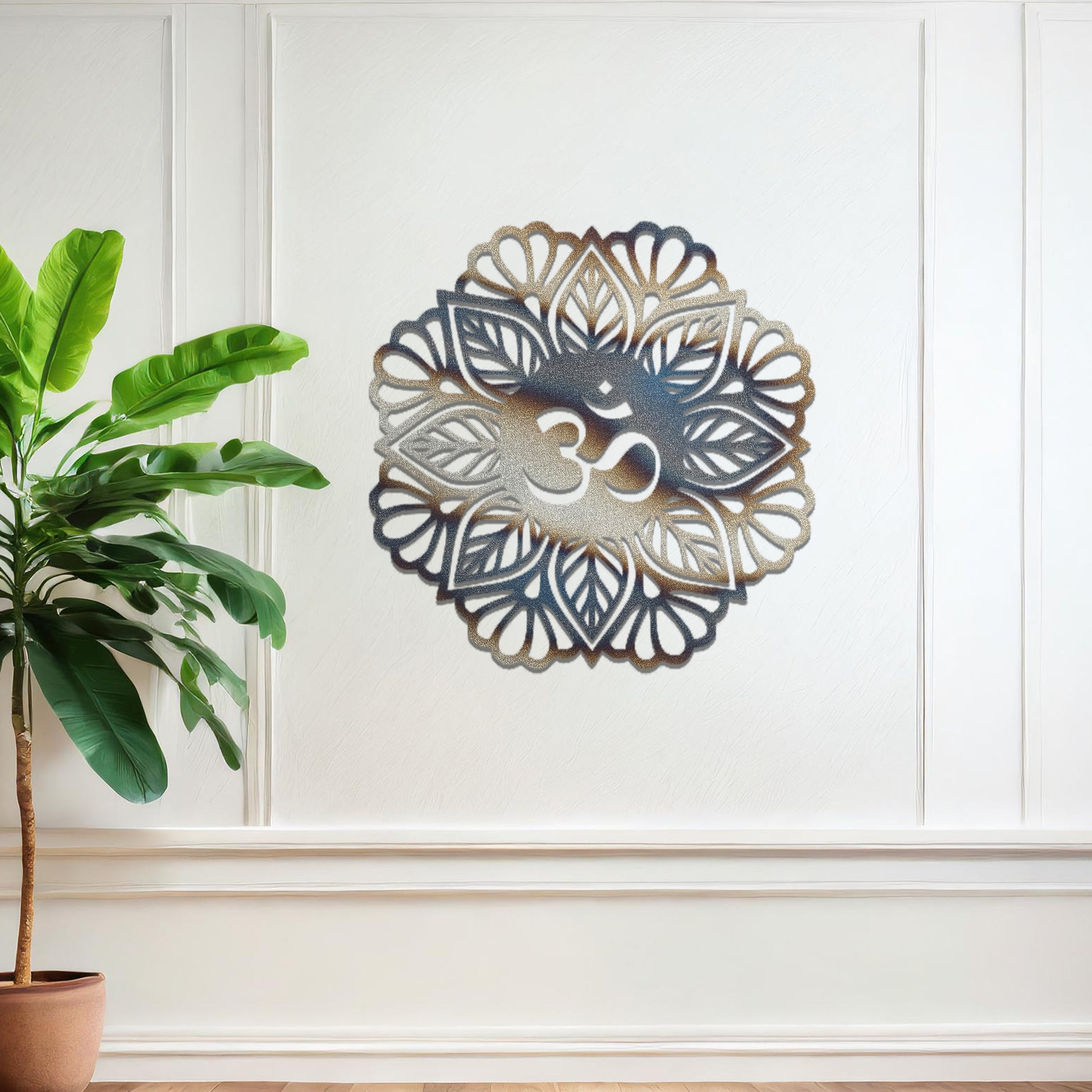 Metal wall art featuring an intricate mandala design with the Om symbol at its center, mounted on a neutral wall within modern decor. The spiritual motif and detailed craftsmanship create a calming and elegant focal point.