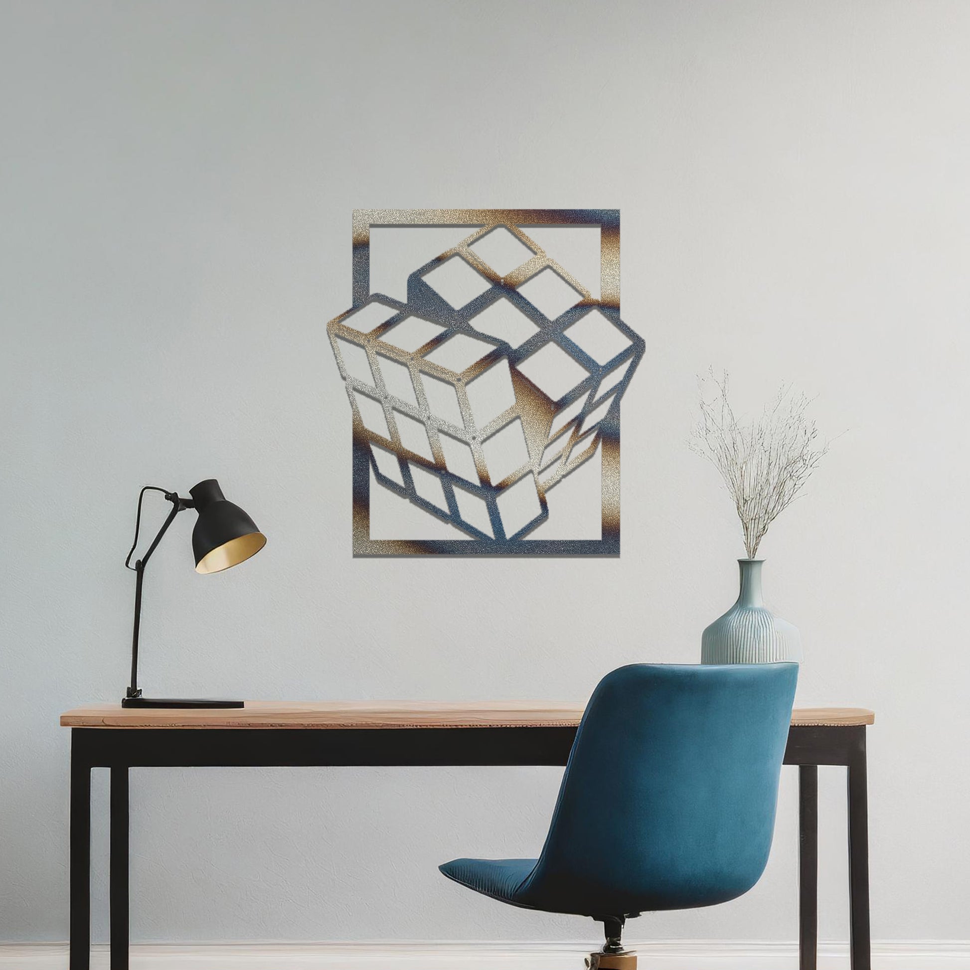 Metal wall art featuring a rectangular design of a three-dimensional cube, showcasing bold geometric shapes and a modern aesthetic as a statement piece.