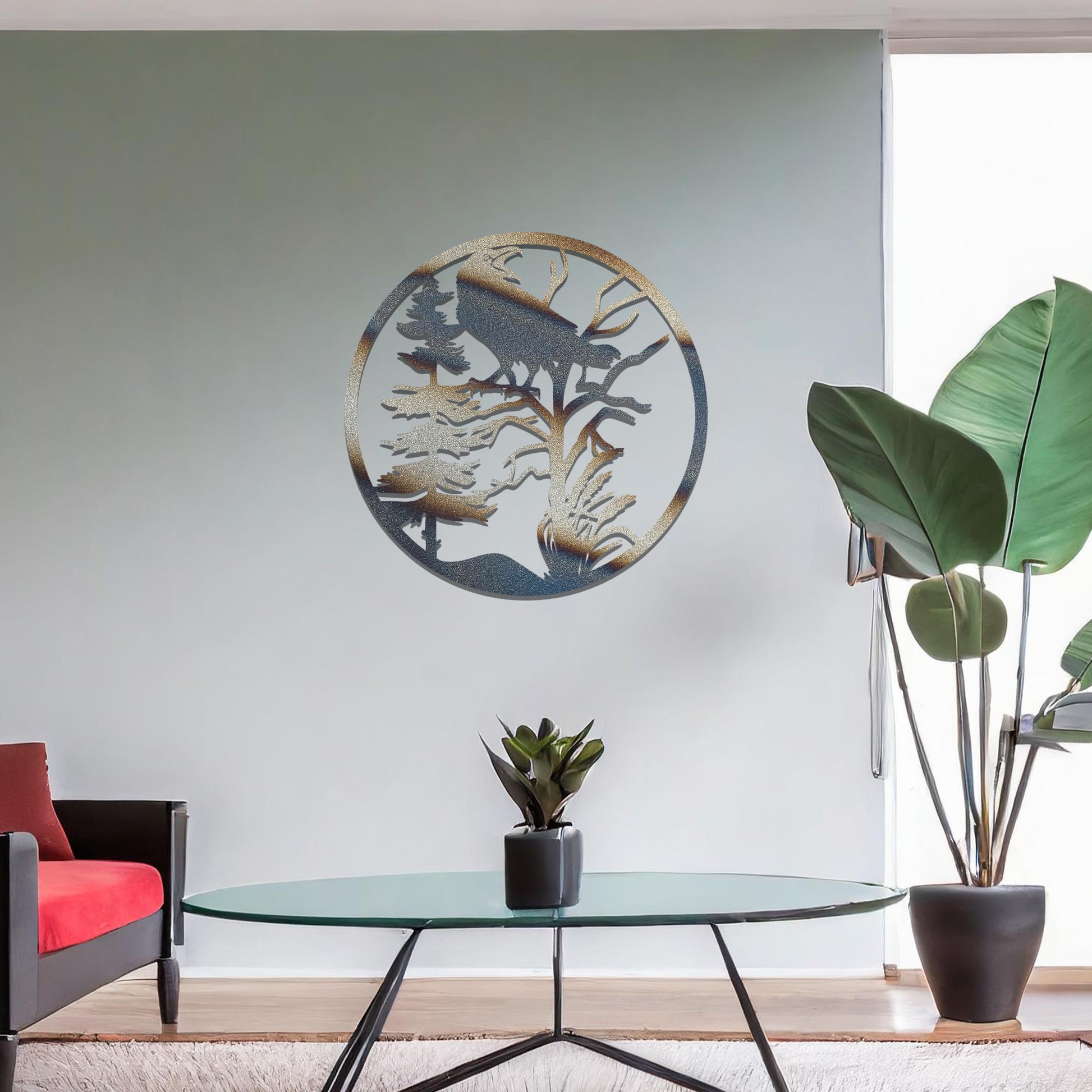 Metal wall art featuring a circular design with a silhouette of a raven perched on a tree branch, surrounded by trees and foliage, mounted on a neutral wall within modern room decor. The intricate detailing and natural motif create a bold and artistic focal point in the space.