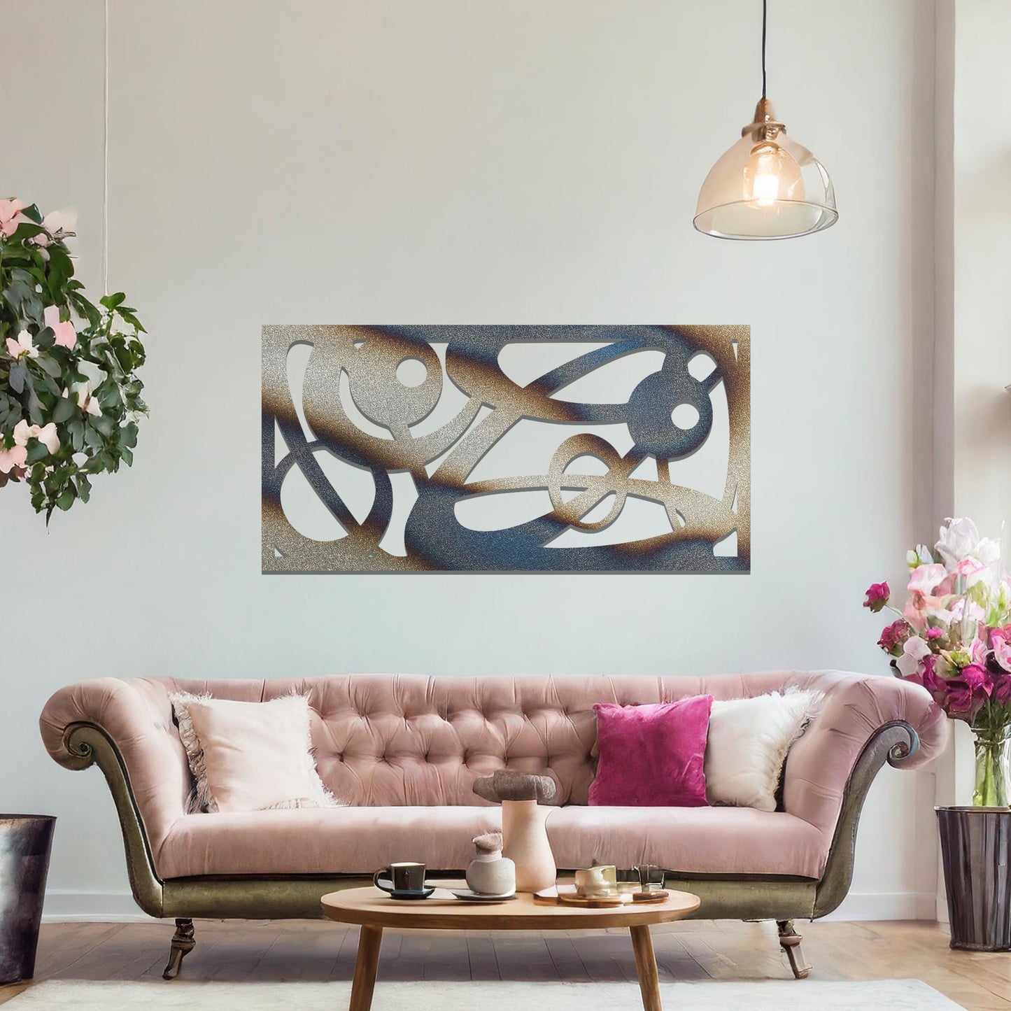 Metal wall art featuring a long, rectangular design with abstract swirling patterns and geometric shapes, mounted on a neutral wall within modern decor. The bold lines and shapes create an eye-catching focal point, adding a touch of artistic flair to the space.