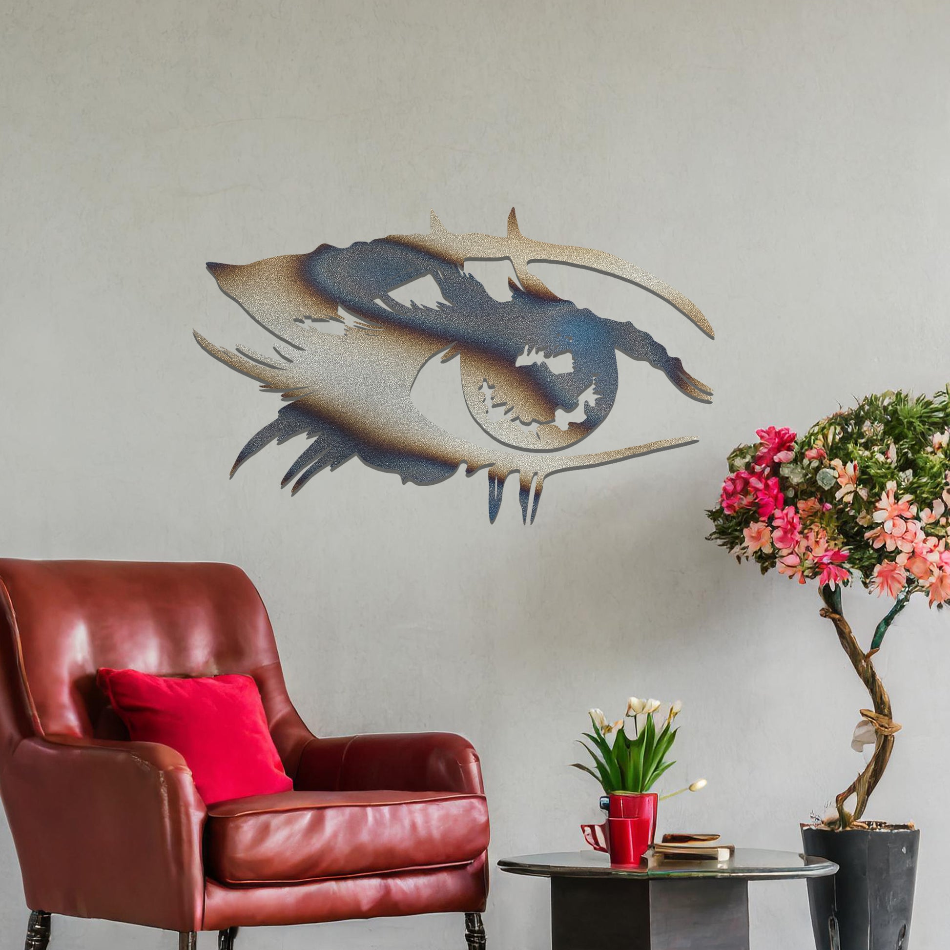 Striking metal wall art featuring a bold and artistic eye design with intricate detailing, mounted on a neutral wall within modern room decor. The focus is entirely on the creative and contemporary craftsmanship of the wall art, enhancing the space's aesthetic appeal.