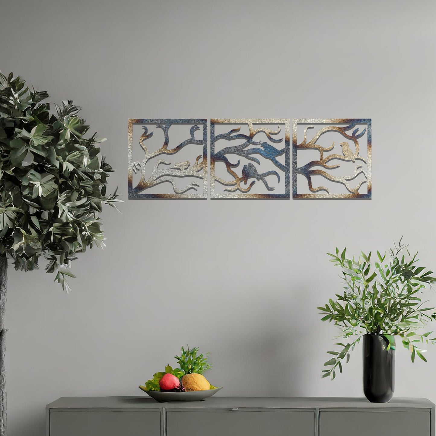 Three-panel metal wall art featuring an elegant design of birds perched on branches, creating a peaceful and nature-inspired aesthetic.