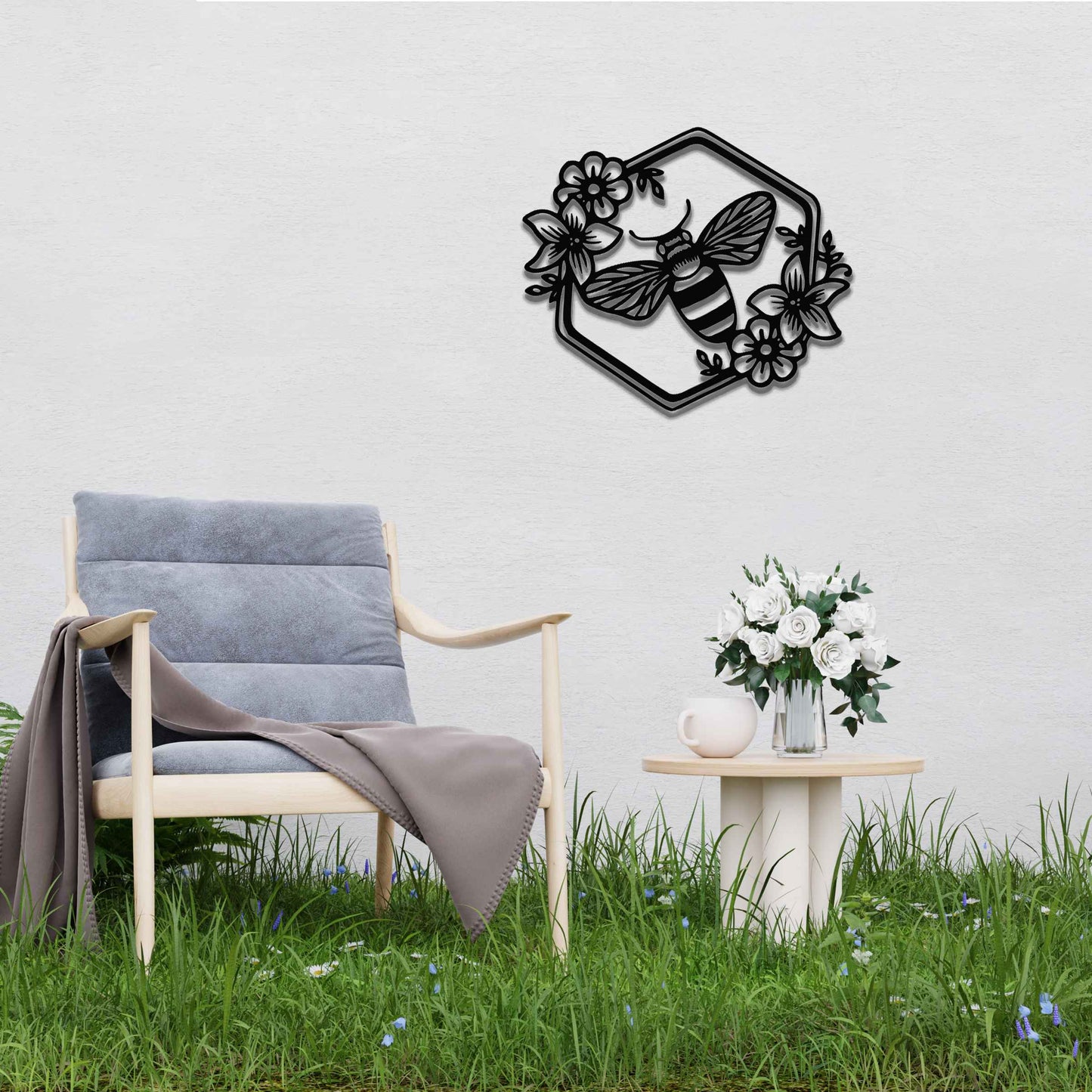 Metal garden decoration showcasing a bee design within a hexagonal frame, adorned with floral details, combining nature-inspired artistry and durability to enhance outdoor spaces with elegance and charm.