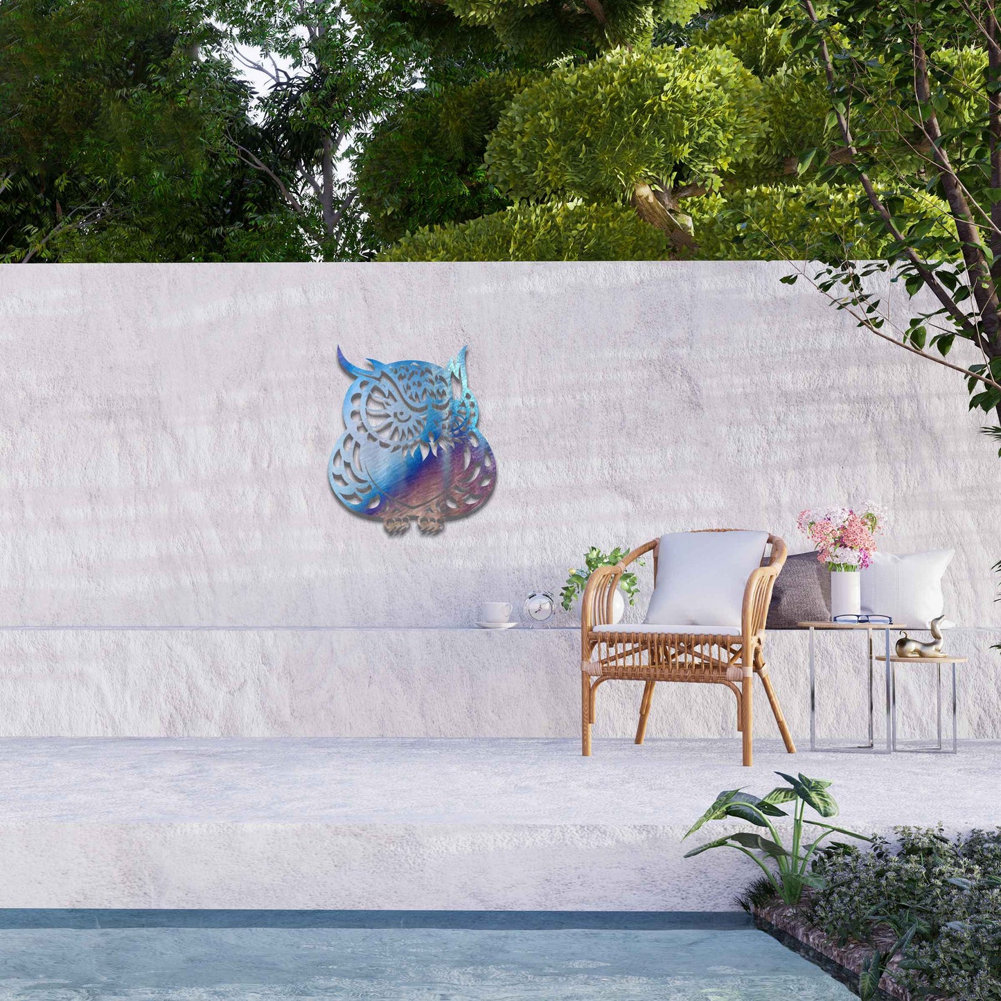 Metal garden decoration featuring a detailed owl design with intricate patterns, adding a touch of nocturnal charm and artistry to outdoor walls, enhancing the beauty of any garden or patio setting.