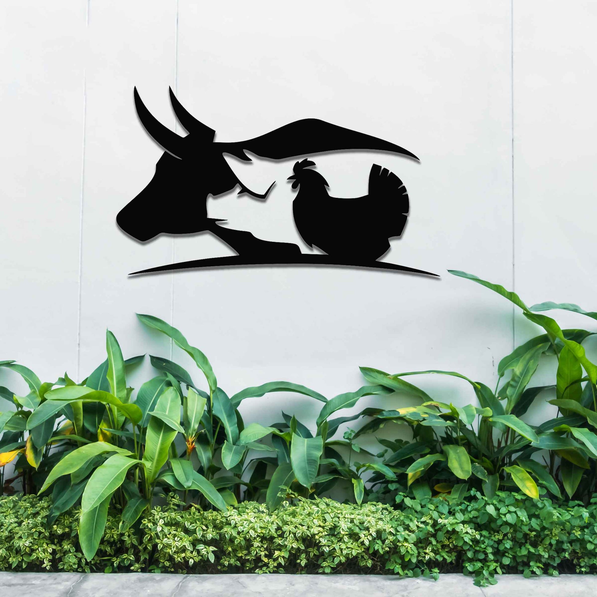 The artwork features a cow, a pig, and a chicken, arranged in a fluid, minimalist design. The cow's head with its distinctive horns forms one part of the composition, followed by the pig and chicken, creating a harmonious flow between the animals. 