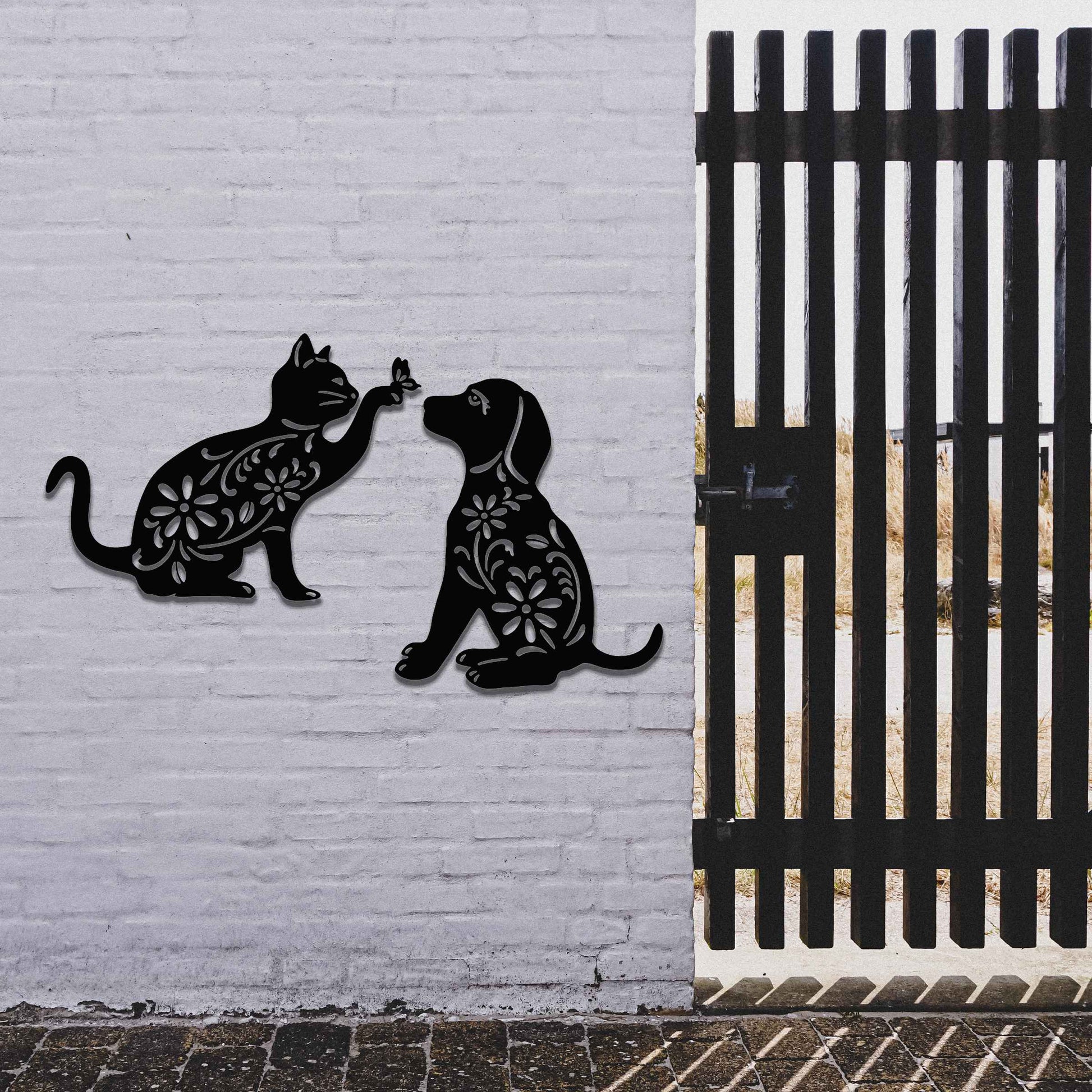 Metal garden decoration set featuring a playful cat reaching for a butterfly and a sitting dog, both adorned with intricate floral patterns, adding a whimsical and charming touch to outdoor walls or fences.