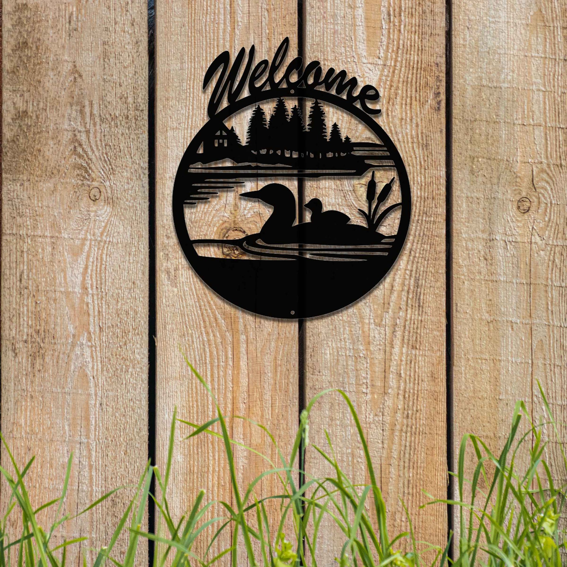 This design features two ducks in a water setting with the word "Welcome" above. The rustic finish adds charm, and the circular shape encapsulates the peaceful imagery, making it ideal for gardens or entrances.