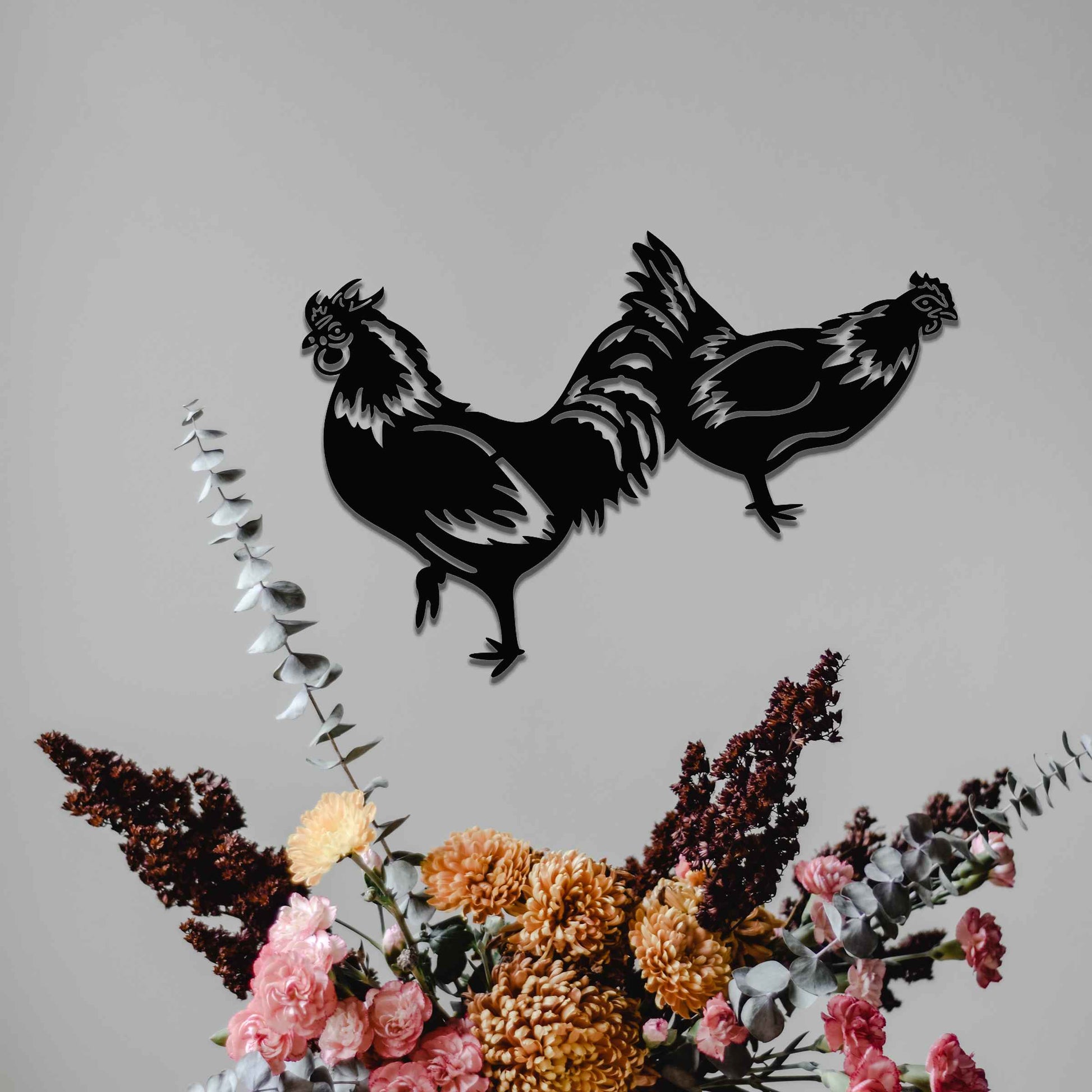 A beautifully crafted design of two roosters in motion, showcasing intricate details and bold lines. This unique piece adds a lively, rustic touch to any decor, highlighting the dynamic nature of the birds.