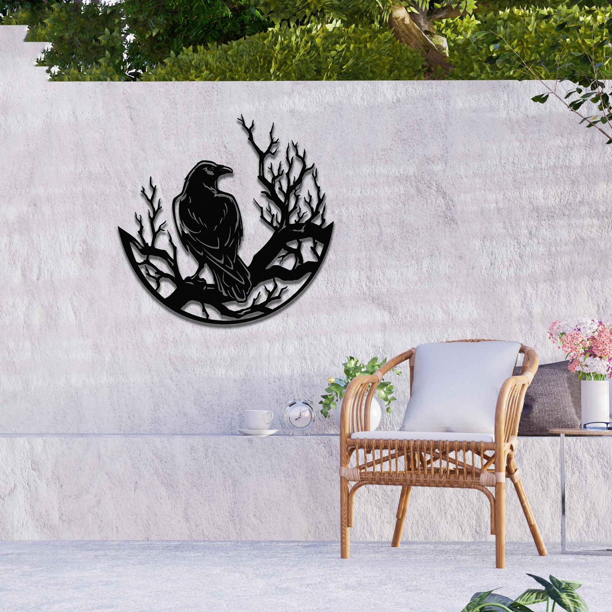 Metal wall decoration featuring a crow perched on detailed tree branches within a circular frame, crafted with intricate cutouts and a rustic finish, adding a bold and artistic touch to indoor or outdoor spaces.