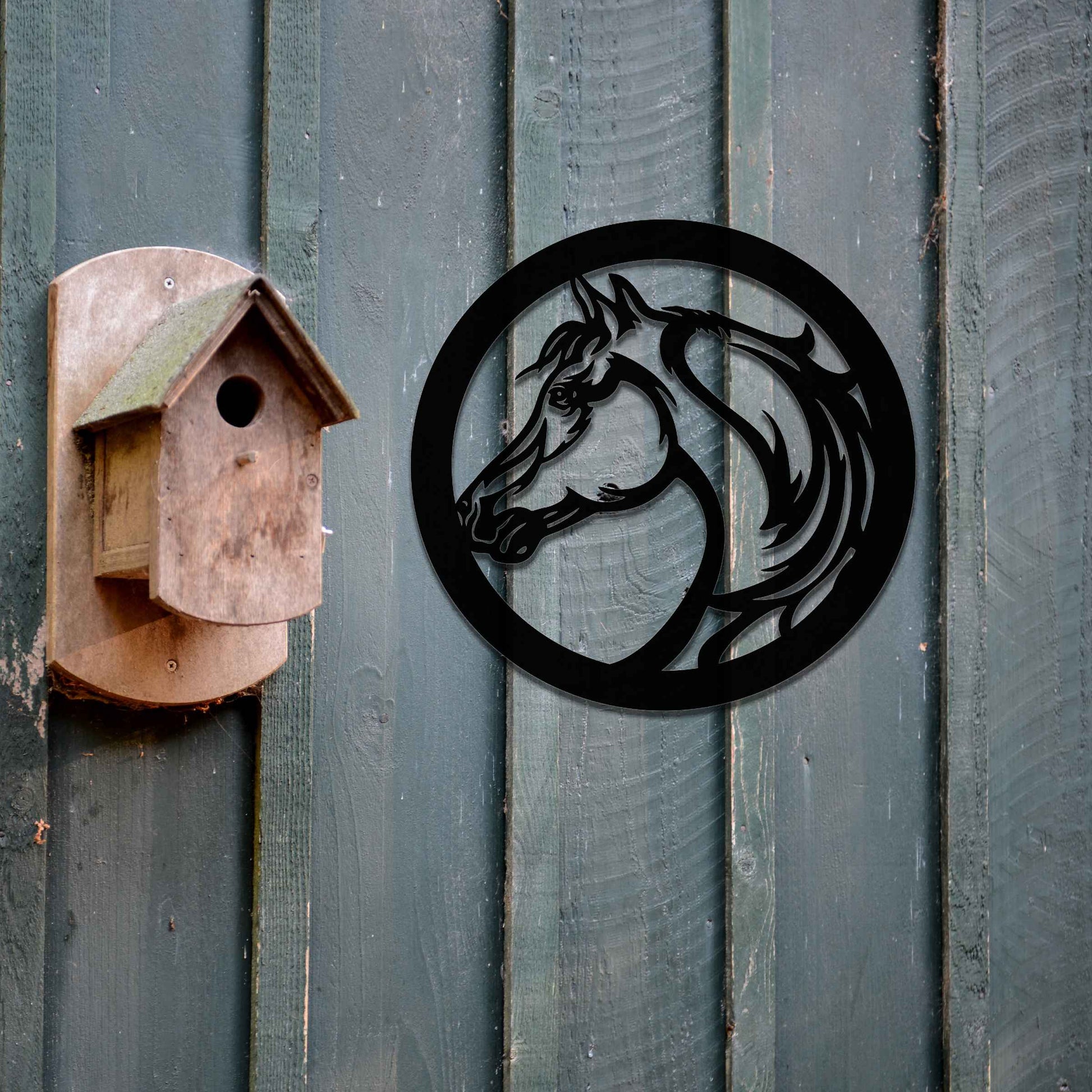 Metal wall art featuring a detailed horse's head within a circular frame, designed with flowing lines and intricate details, perfect for horse lovers.