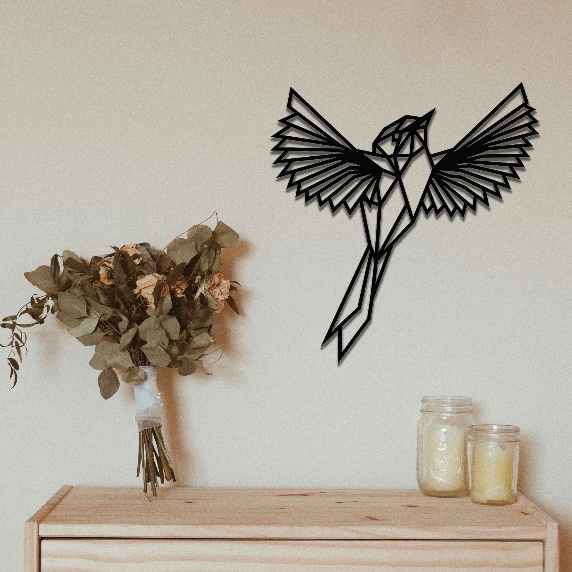 Metal garden decoration featuring a geometric bird design in flight, crafted with sharp, angular detailing for a modern and artistic touch, perfect for enhancing outdoor or indoor spaces with unique charm.