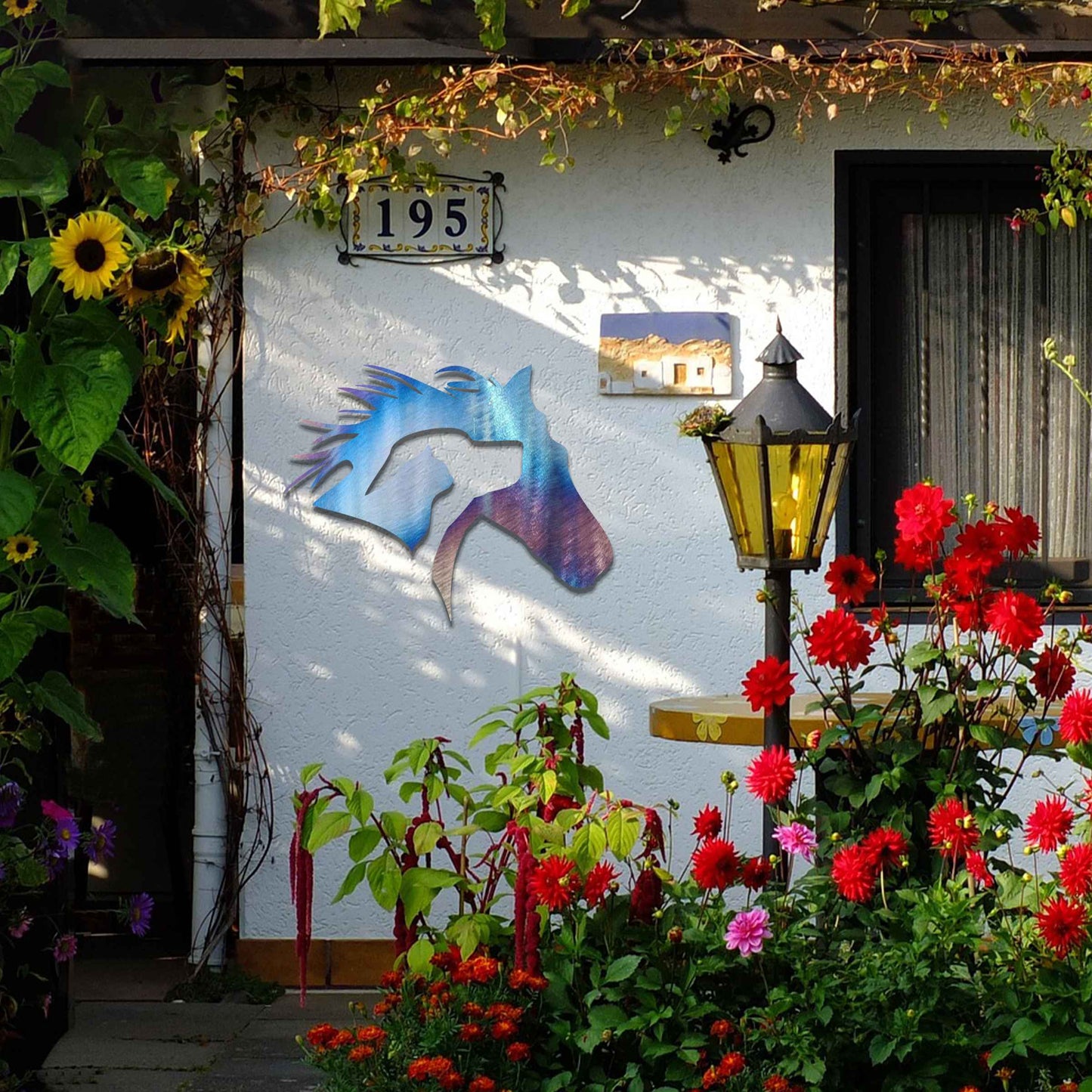 Metal wall art featuring a horse's head with a dog and cat inside, designed with intricate details and flowing lines, perfect for animal lovers.