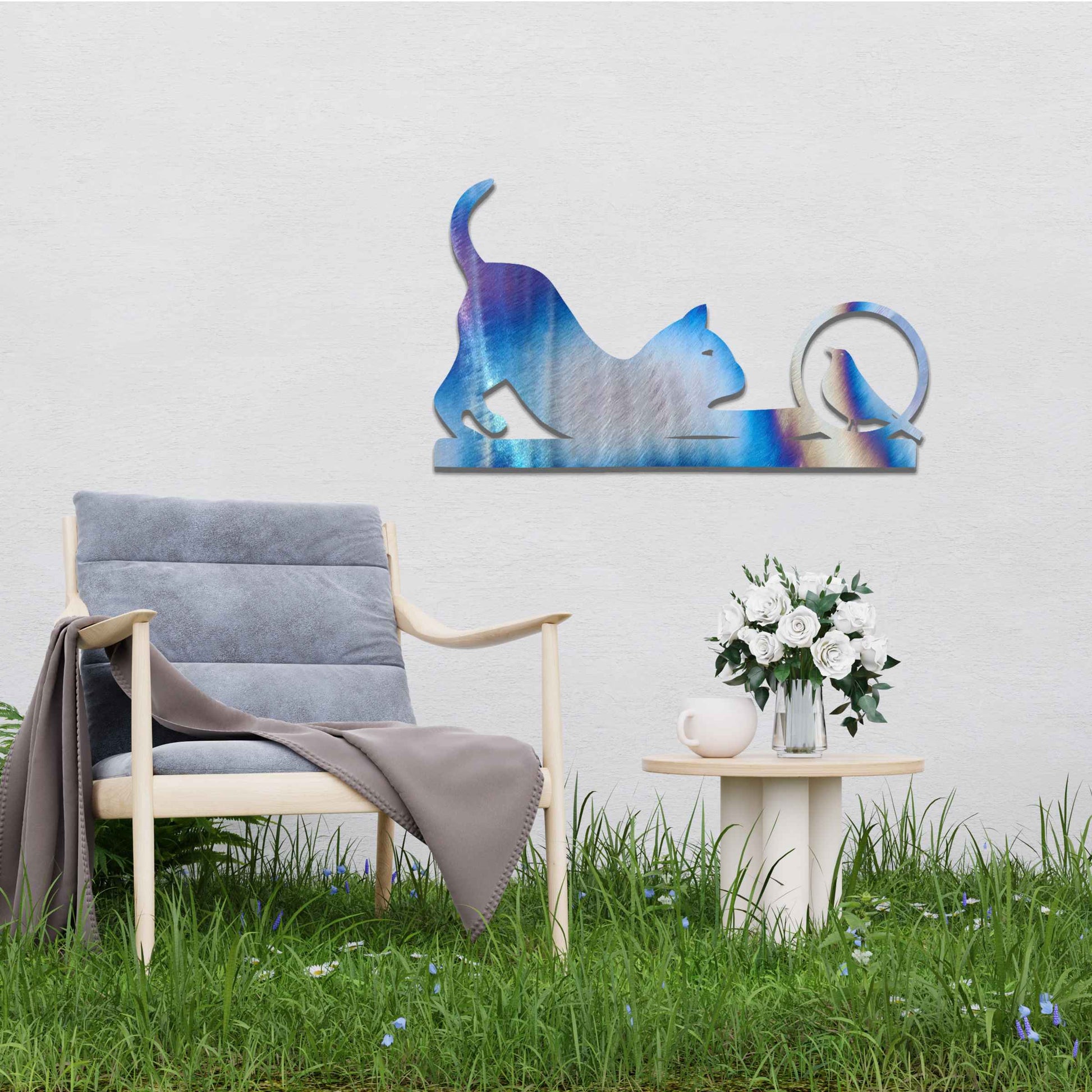 Metal wall art featuring a playful cat crouching in curiosity with a bird perched nearby, perfect for adding a touch of whimsy and nature-inspired charm to your garden, fence, or outdoor decor.