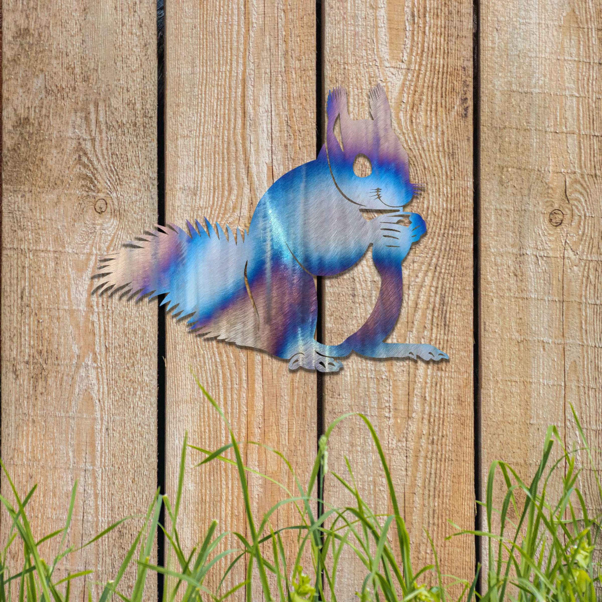 Metal wall decoration featuring a squirrel design with intricate details, adding a playful and artistic touch to indoor spaces, displayed on a neutral wall to highlight its elegant craftsmanship.