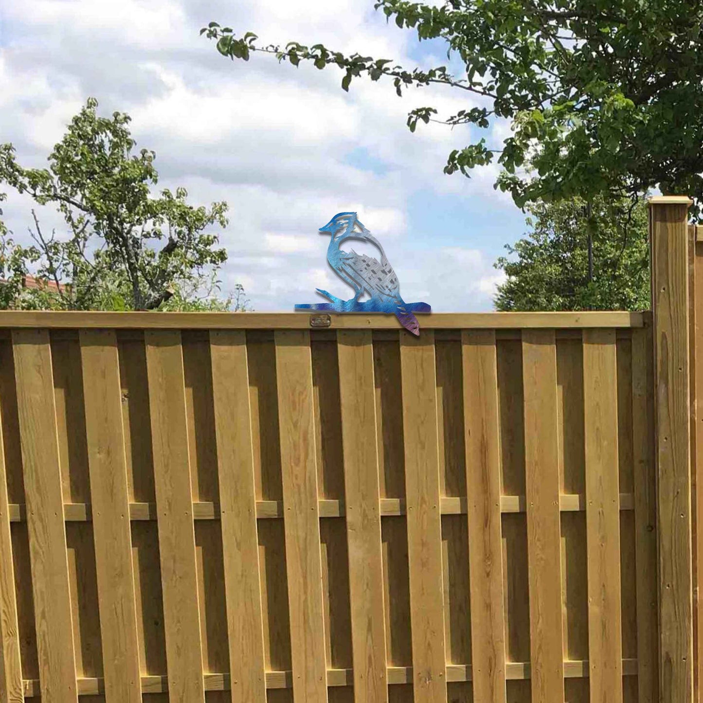 Metal garden decoration featuring a woodpecker silhouette with intricate cutout details and a rustic finish, designed to perch on wooden beams or posts, adding a natural and artistic touch to outdoor spaces.