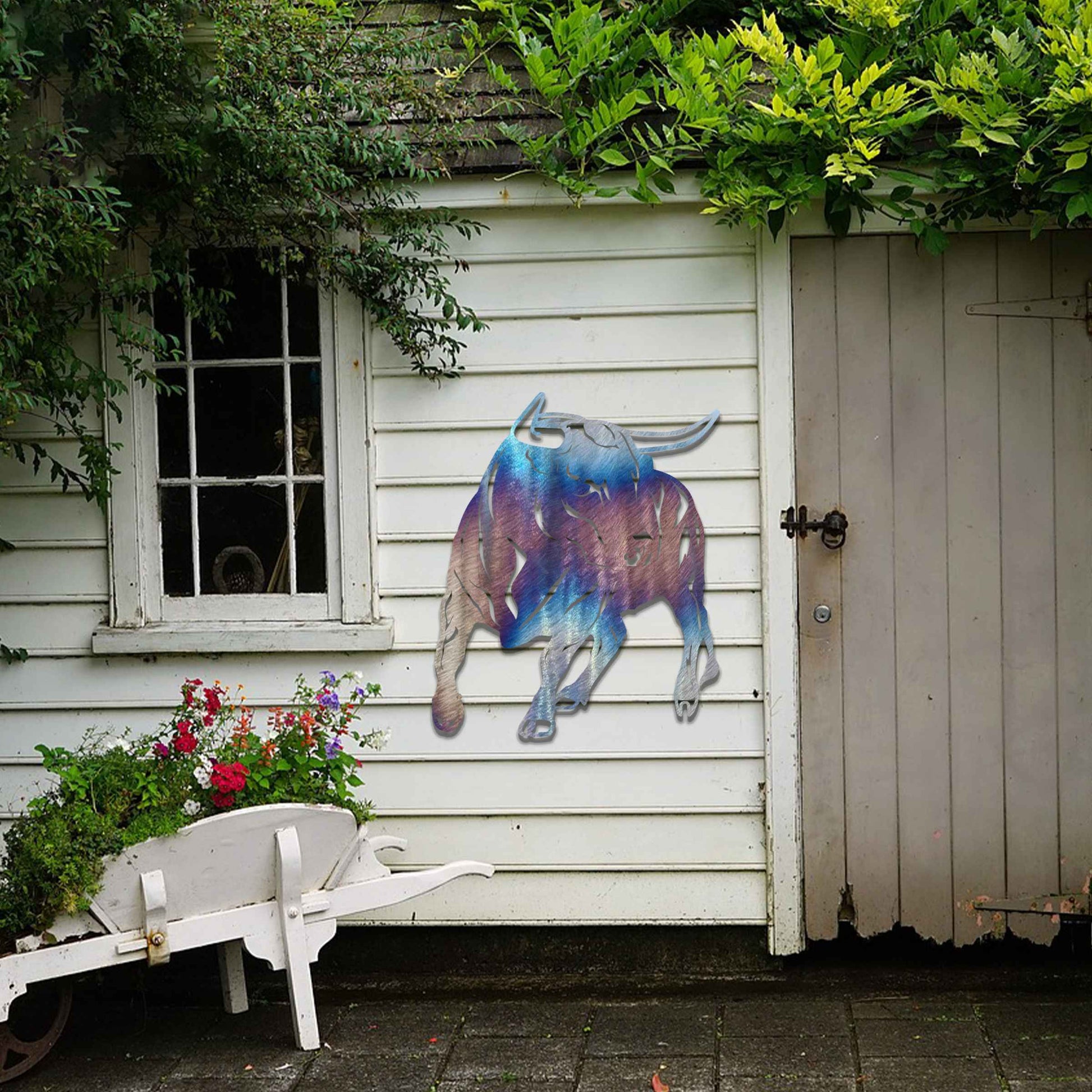The design features a dynamic bull captured in a strong and assertive pose, showcasing its muscular build. The bull’s stance emphasizes power and movement, conveying a sense of energy and resilience.