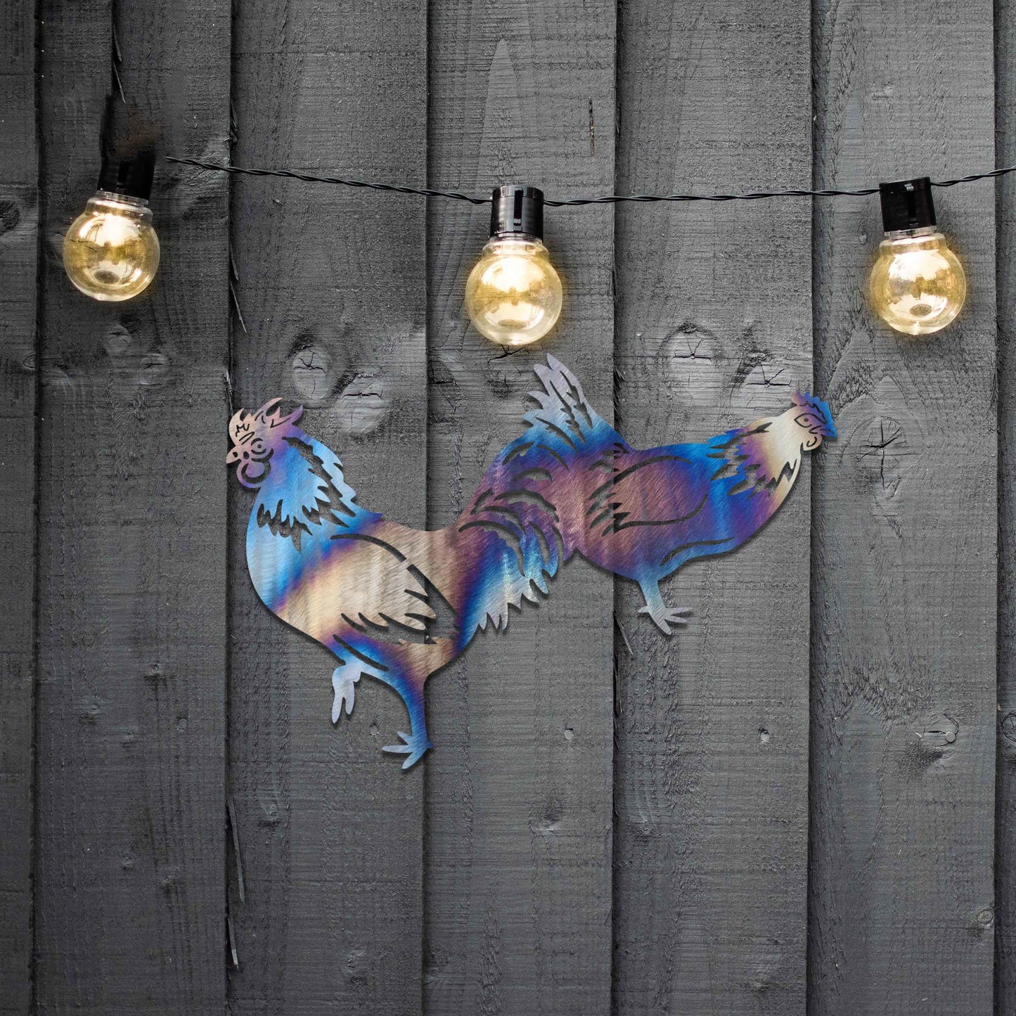 A beautifully crafted design of two roosters in motion, showcasing intricate details and bold lines. This unique piece adds a lively, rustic touch to any decor, highlighting the dynamic nature of the birds.