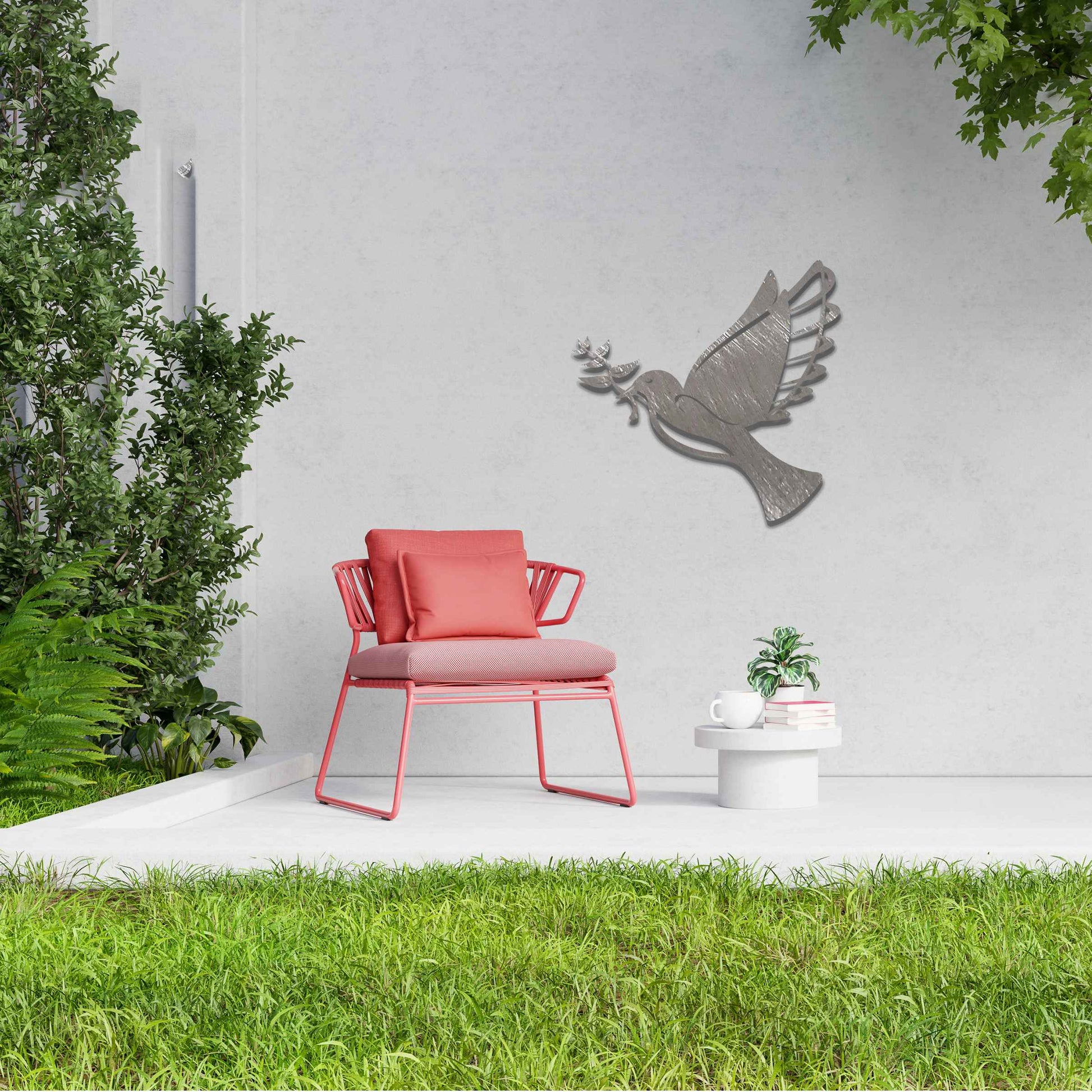 Metal garden decoration featuring a dove in flight holding an olive branch, crafted with a rustic finish, symbolising peace and harmony while adding a touch of elegance and meaning to outdoor spaces.