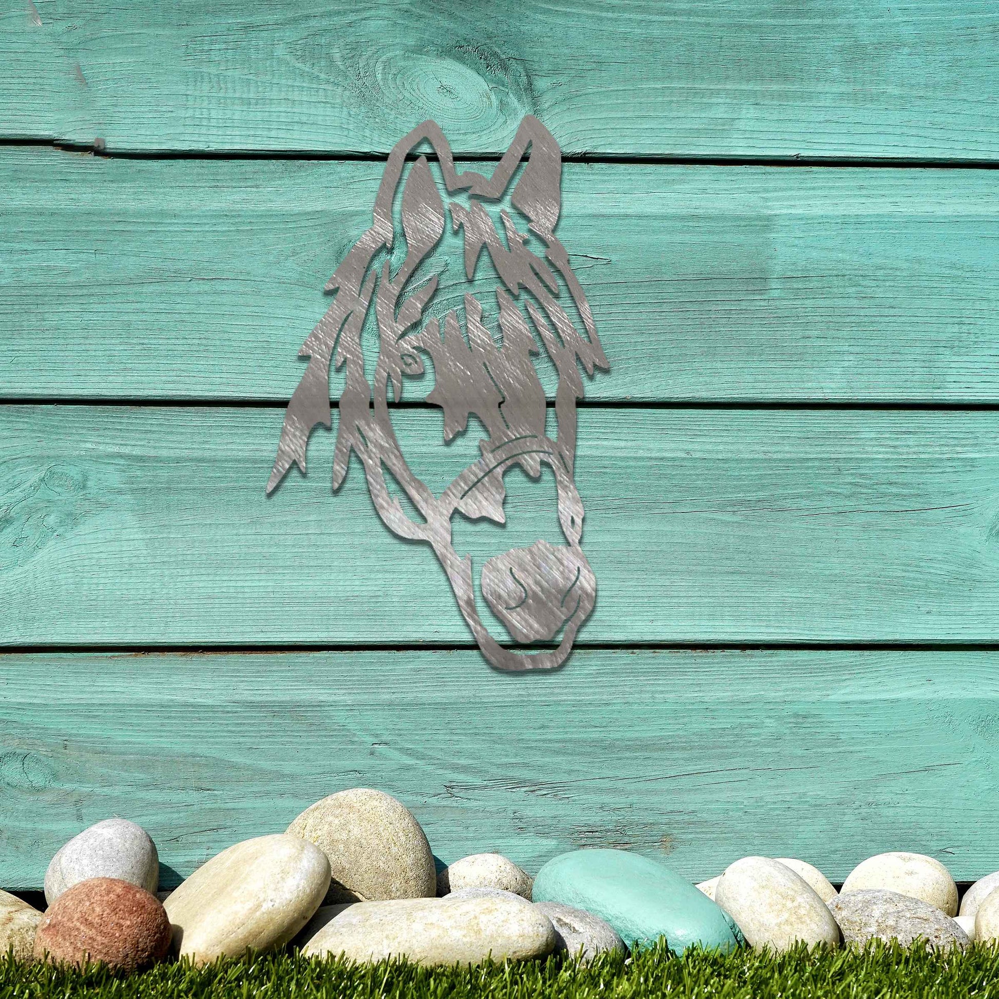A detailed design of a horse's head, with a focus on the face and mane, highlighting its distinctive features and expression.