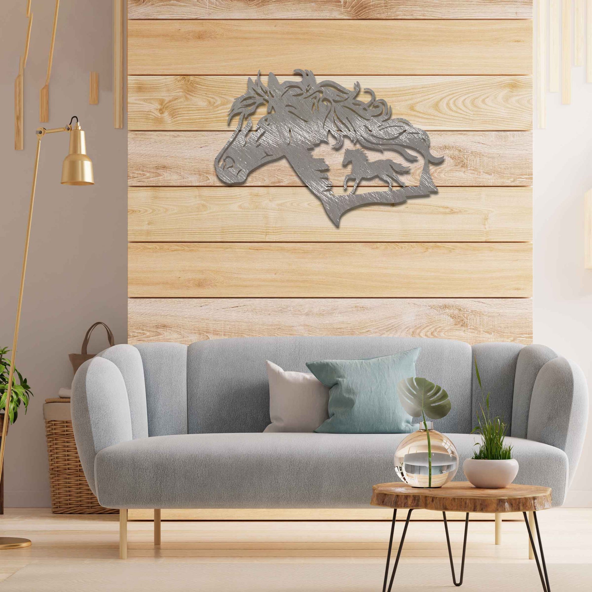 Metal wall decoration featuring a horse head silhouette with flowing mane details and a smaller horse figure within, crafted with intricate cutouts and a rustic finish, adding a majestic and artistic touch to indoor or outdoor spaces.