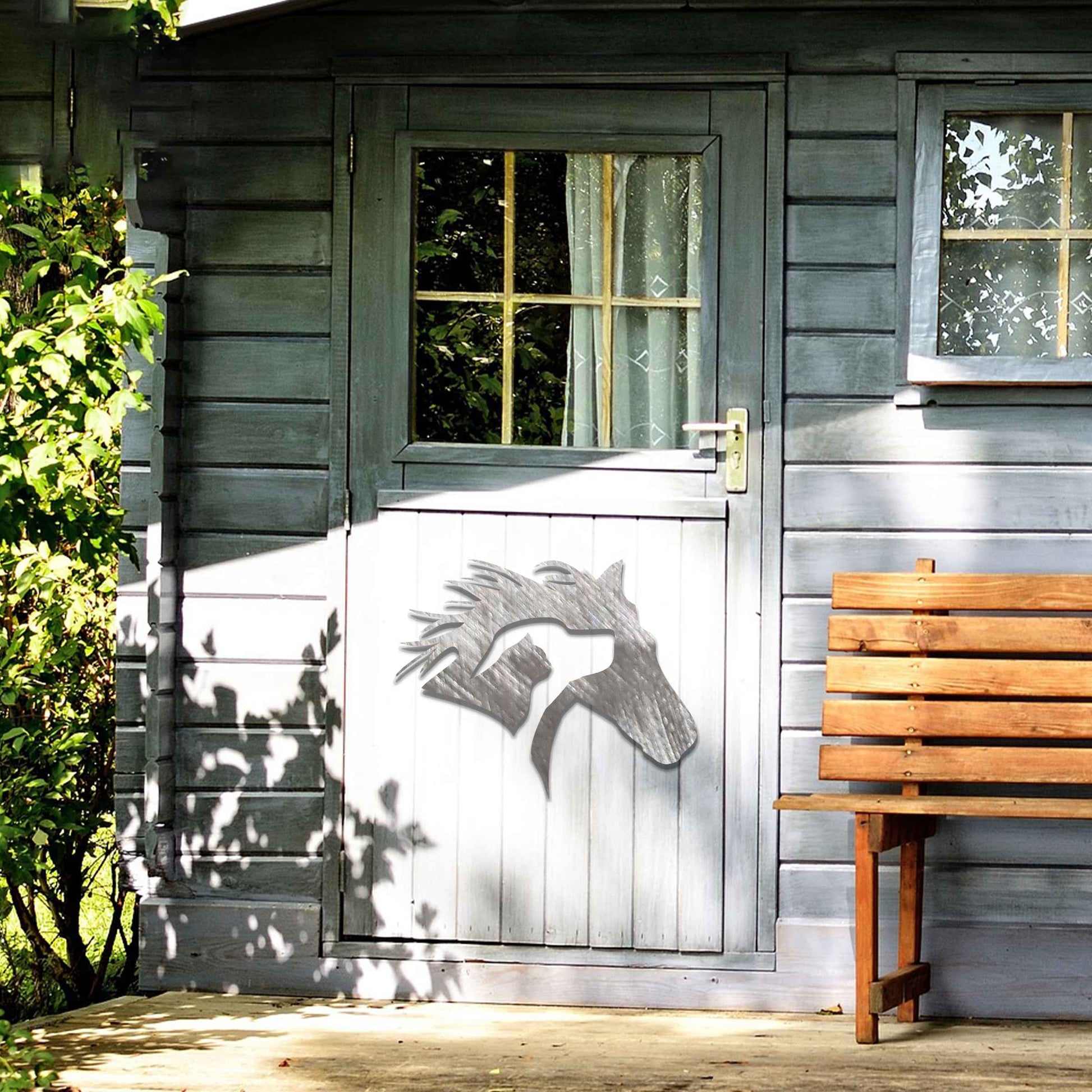 Metal wall art featuring a horse's head with a dog and cat inside, designed with intricate details and flowing lines, perfect for animal lovers.