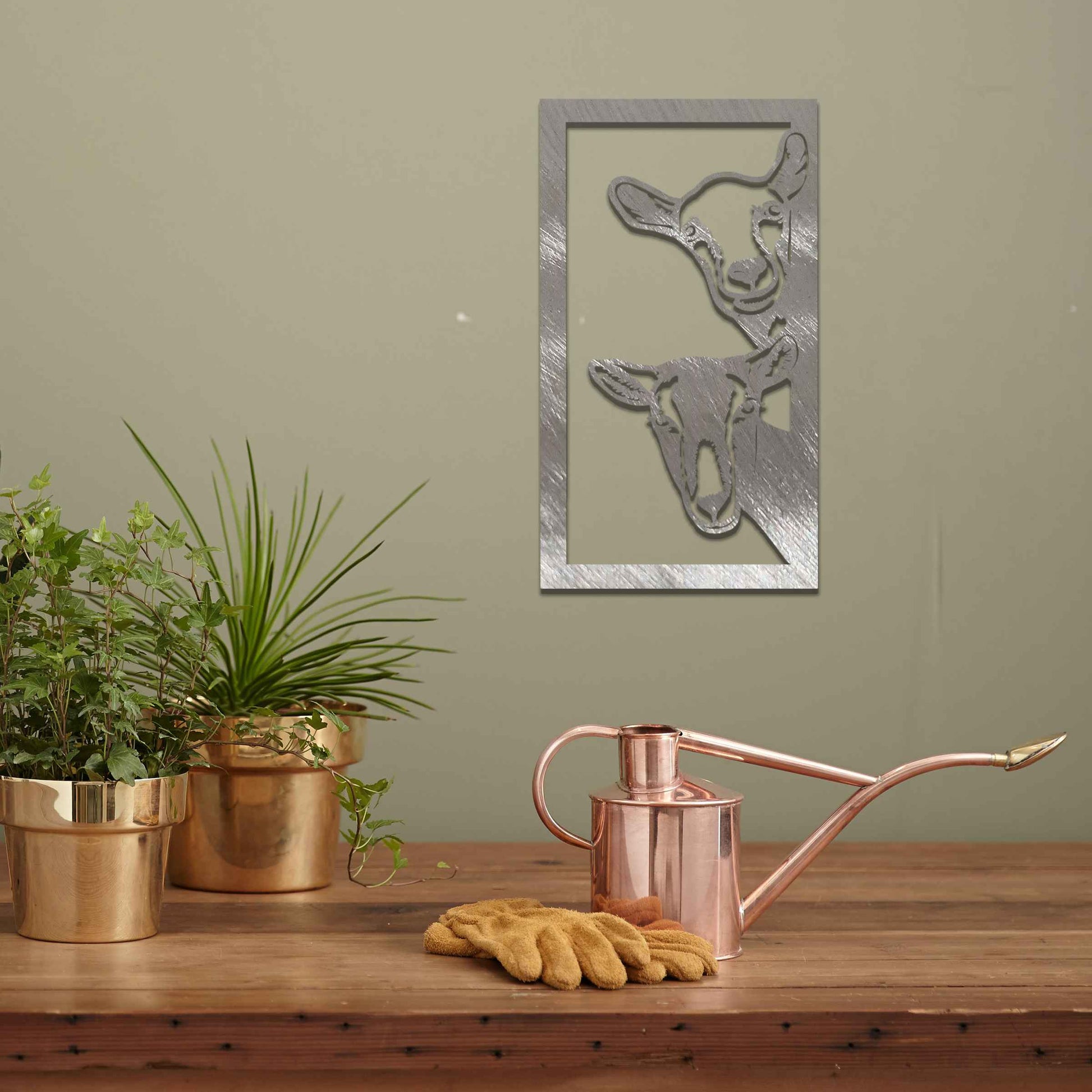 A striking design showcasing the faces of two goats, framed in a vertical panel. The detailed depiction of their expressions brings a unique charm to this modern, rustic wall art piece.