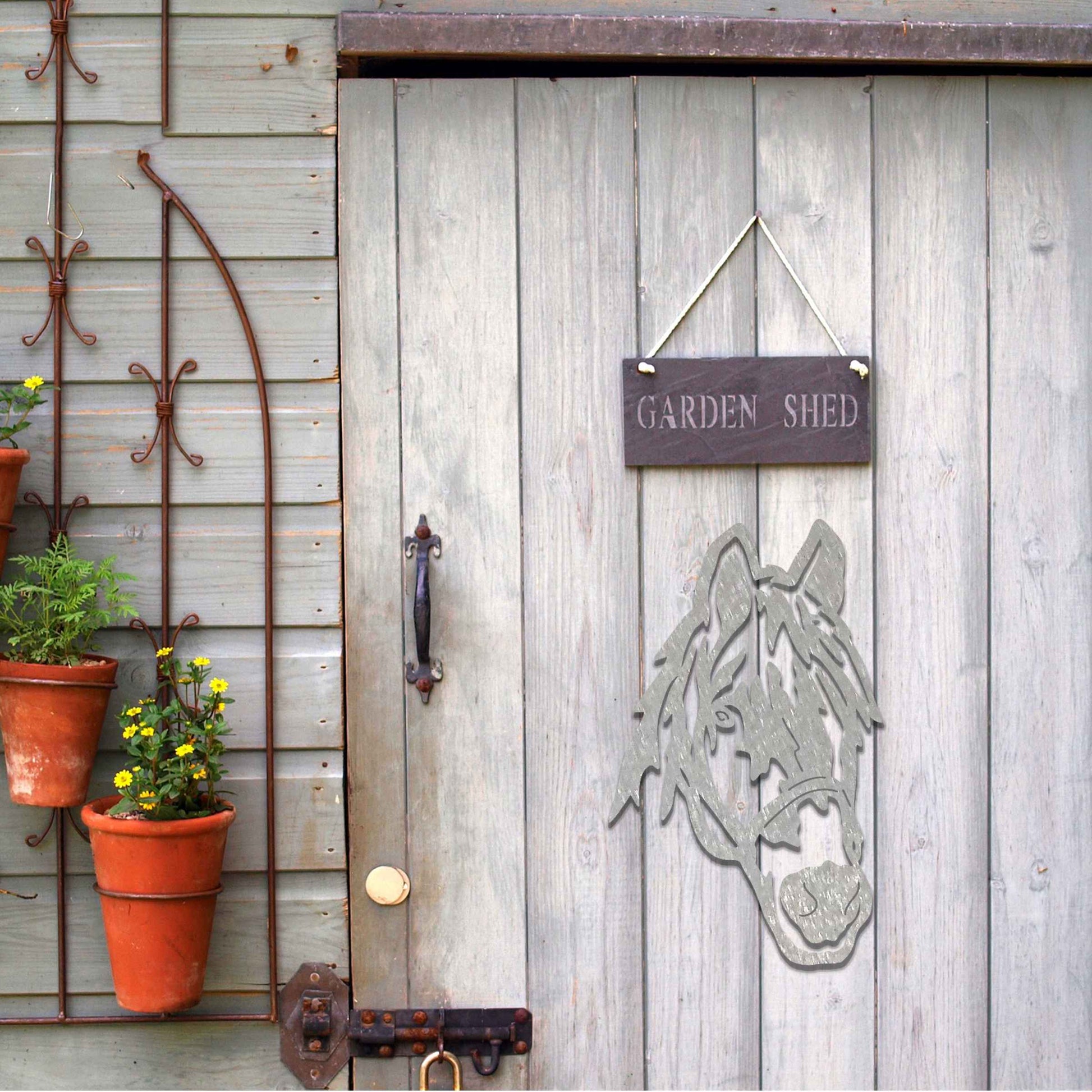 A detailed design of a horse's head, with a focus on the face and mane, highlighting its distinctive features and expression.