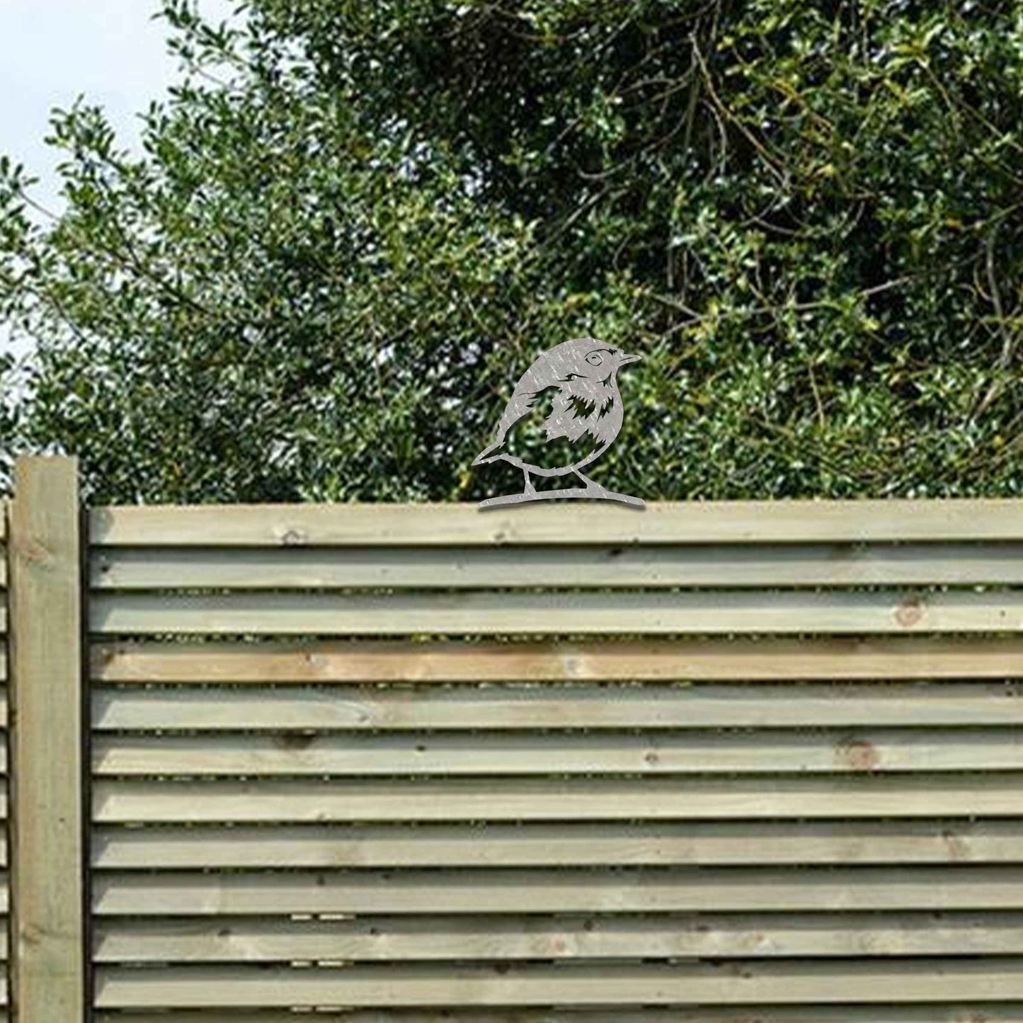 Metal garden decoration featuring a robin silhouette with a rustic finish, designed to sit atop fences or posts, adding a charming and natural touch to outdoor garden spaces.