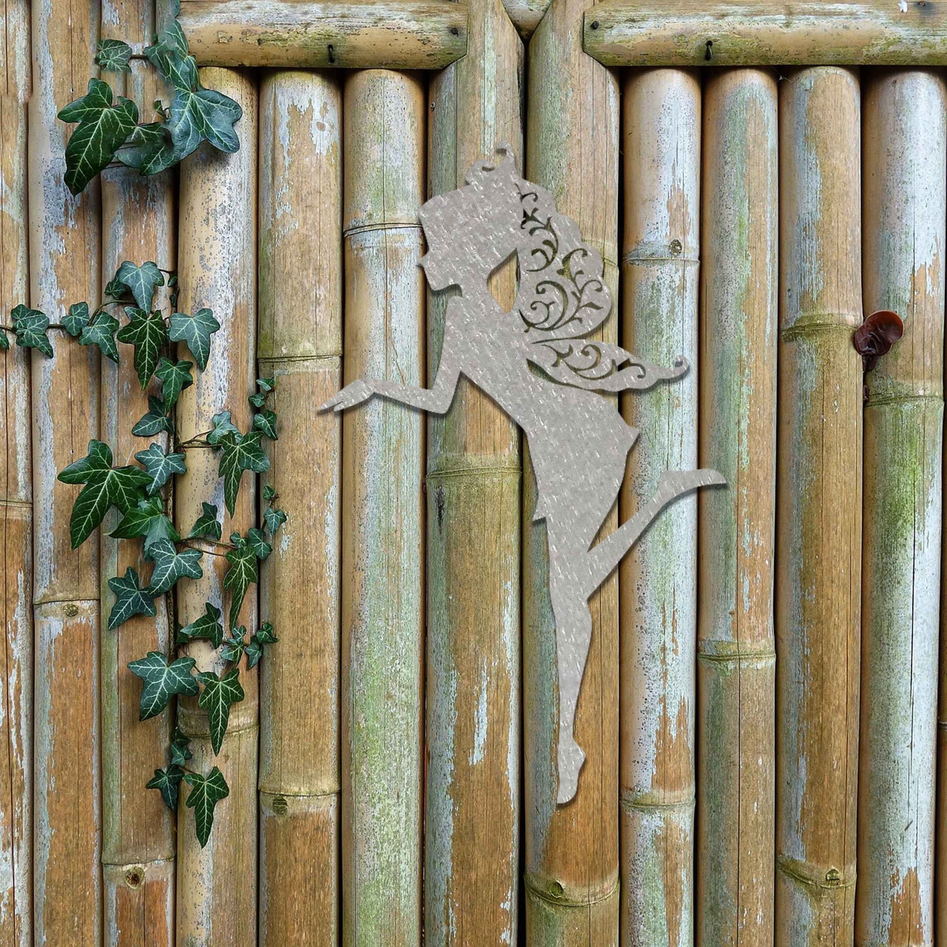 Thank you for the clarification! The design features a silhouette of a fairy in a graceful pose, with flowing hair and wings. The fairy is captured in mid-motion, bringing a sense of whimsy and elegance to the artwork.