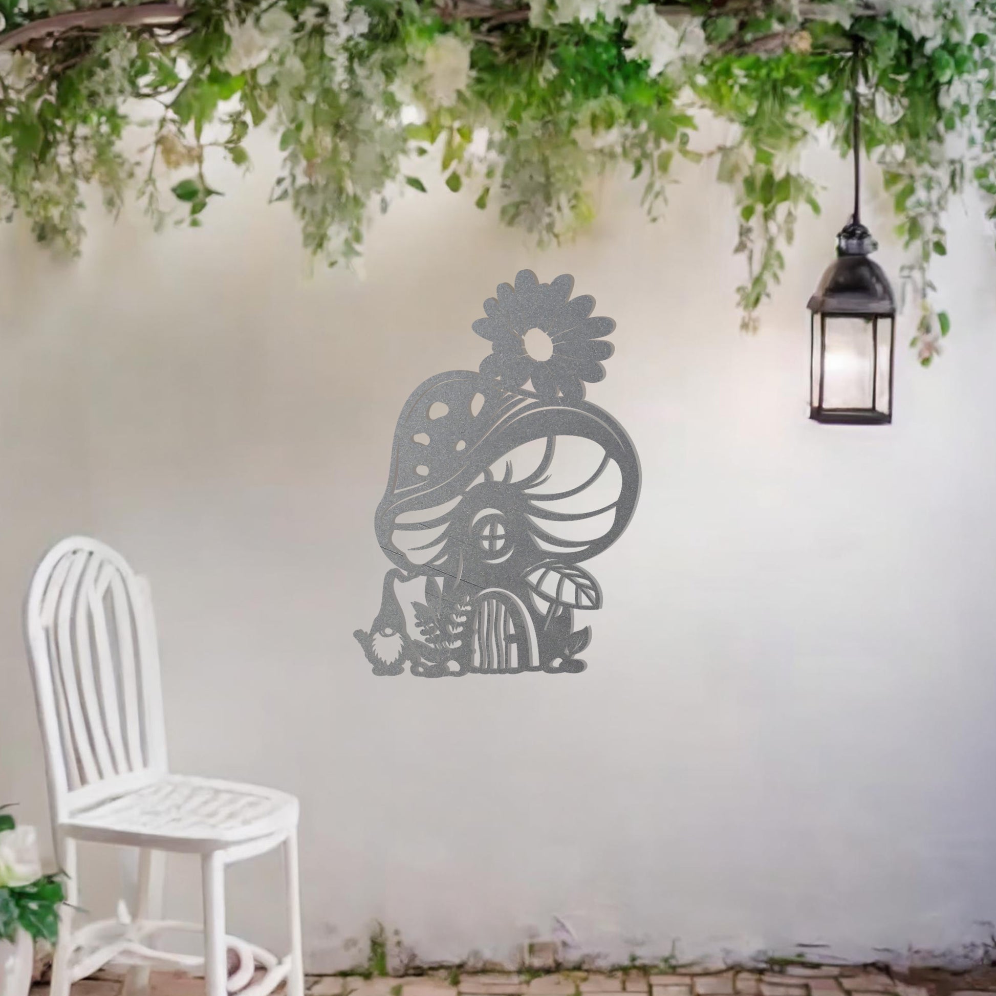 Metal garden decoration featuring a whimsical mushroom house adorned with floral and foliage details, crafted with intricate patterns, adding an enchanting and playful touch to outdoor or indoor spaces.