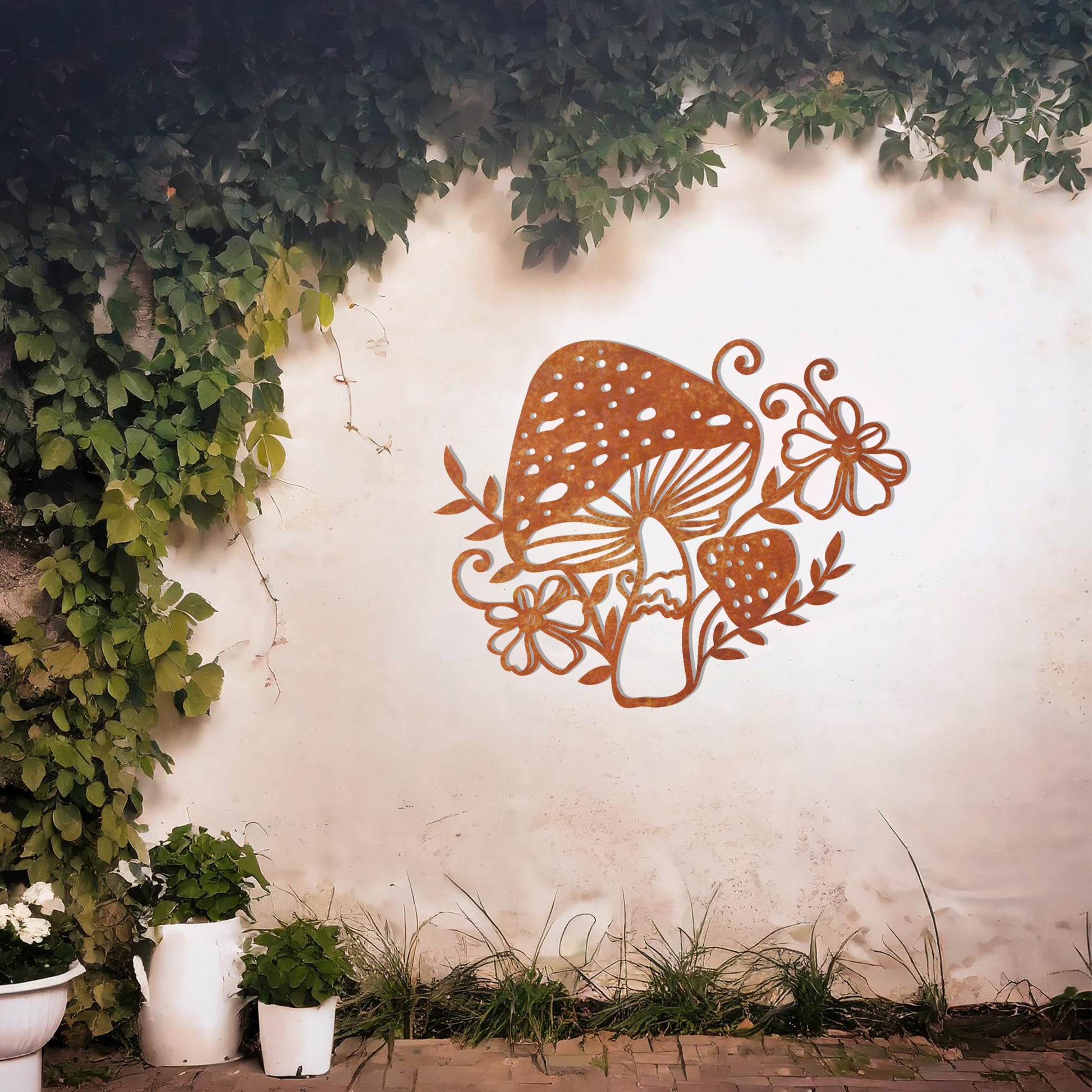 Metal garden decoration featuring a whimsical mushroom design surrounded by floral and leafy accents, intricately crafted to bring a touch of nature-inspired charm and artistry to outdoor spaces