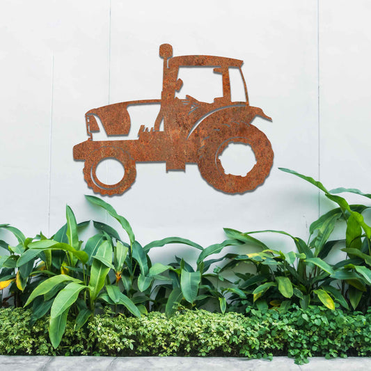 Metal garden decoration featuring a tractor silhouette with detailed cutouts and a rustic finish, designed to enhance outdoor walls or garden spaces, adding a vintage and countryside-inspired charm.