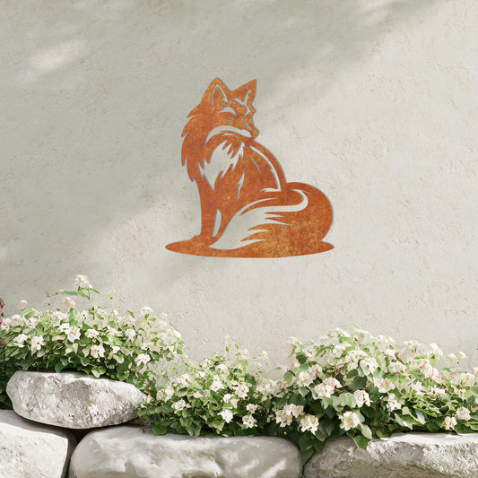 This metal wall art design depicts a sitting fox, elegantly turned to the side, showcasing its bushy tail and graceful silhouette. The minimalist yet detailed cutout enhances the fox's serene and poised demeanor, adding a touch of sophistication to any space.