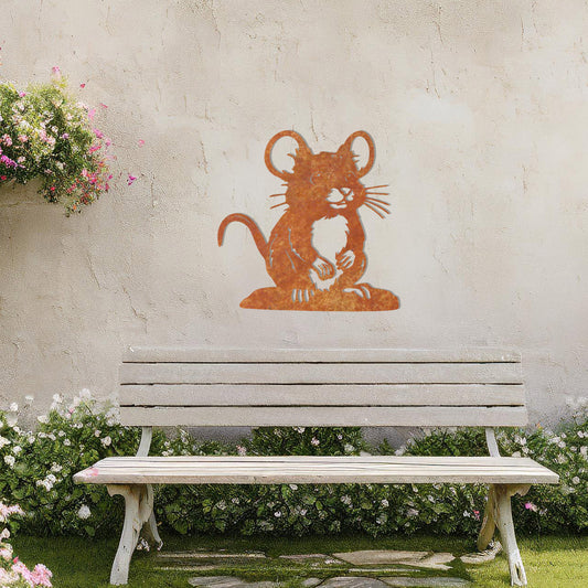A delightful metal wall art piece featuring a whimsical mouse perched on a platform, adding a playful charm to a neutral wall. Perfect for modern garden decor, this design blends seamlessly with lush greenery and an outdoor water feature.