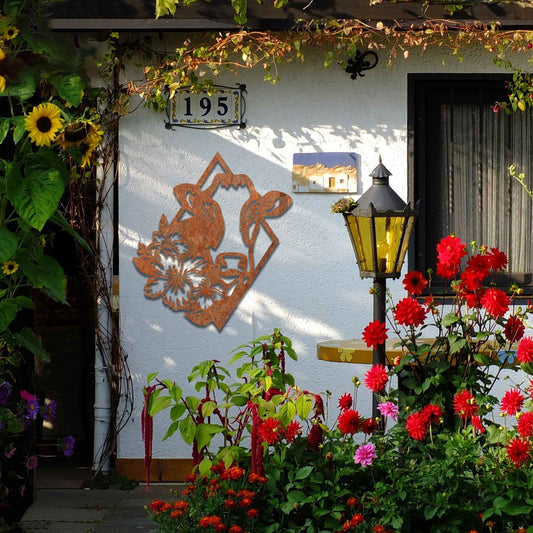 The design features a cow's face framed by a geometric shape, with flowers on its side, combining natural and abstract elements in a modern, stylized way.