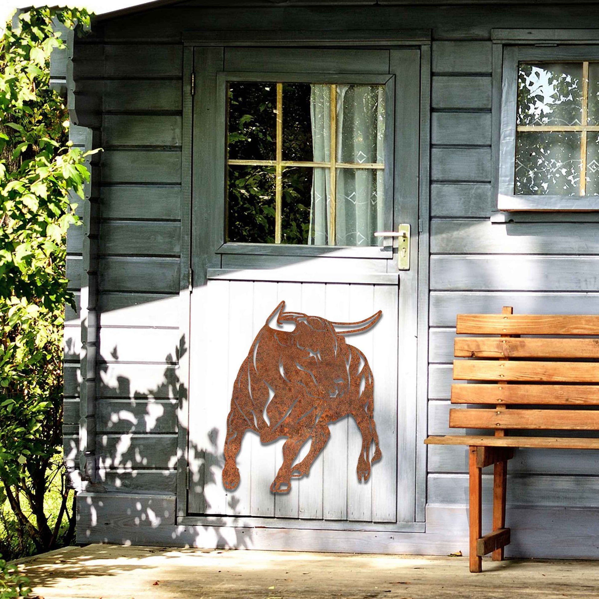 The design features a dynamic bull captured in a strong and assertive pose, showcasing its muscular build. The bull’s stance emphasizes power and movement, conveying a sense of energy and resilience.