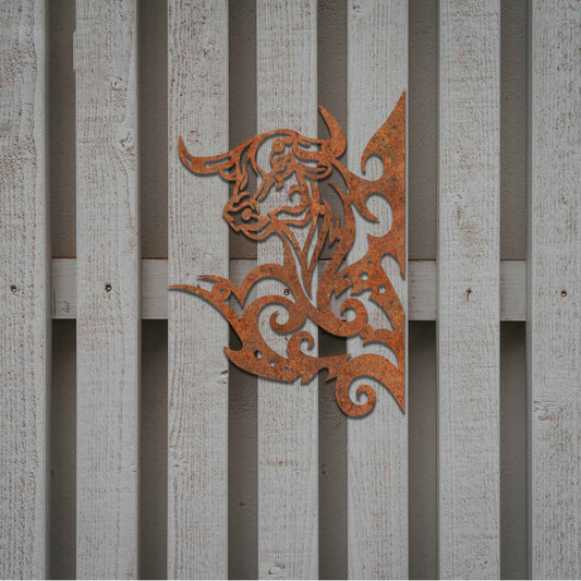 This design showcases a bull's head surrounded by dynamic, swirling lines. The intricate detailing captures the strength and power of the bull, with the bold and stylized swirls adding a sense of motion and energy.